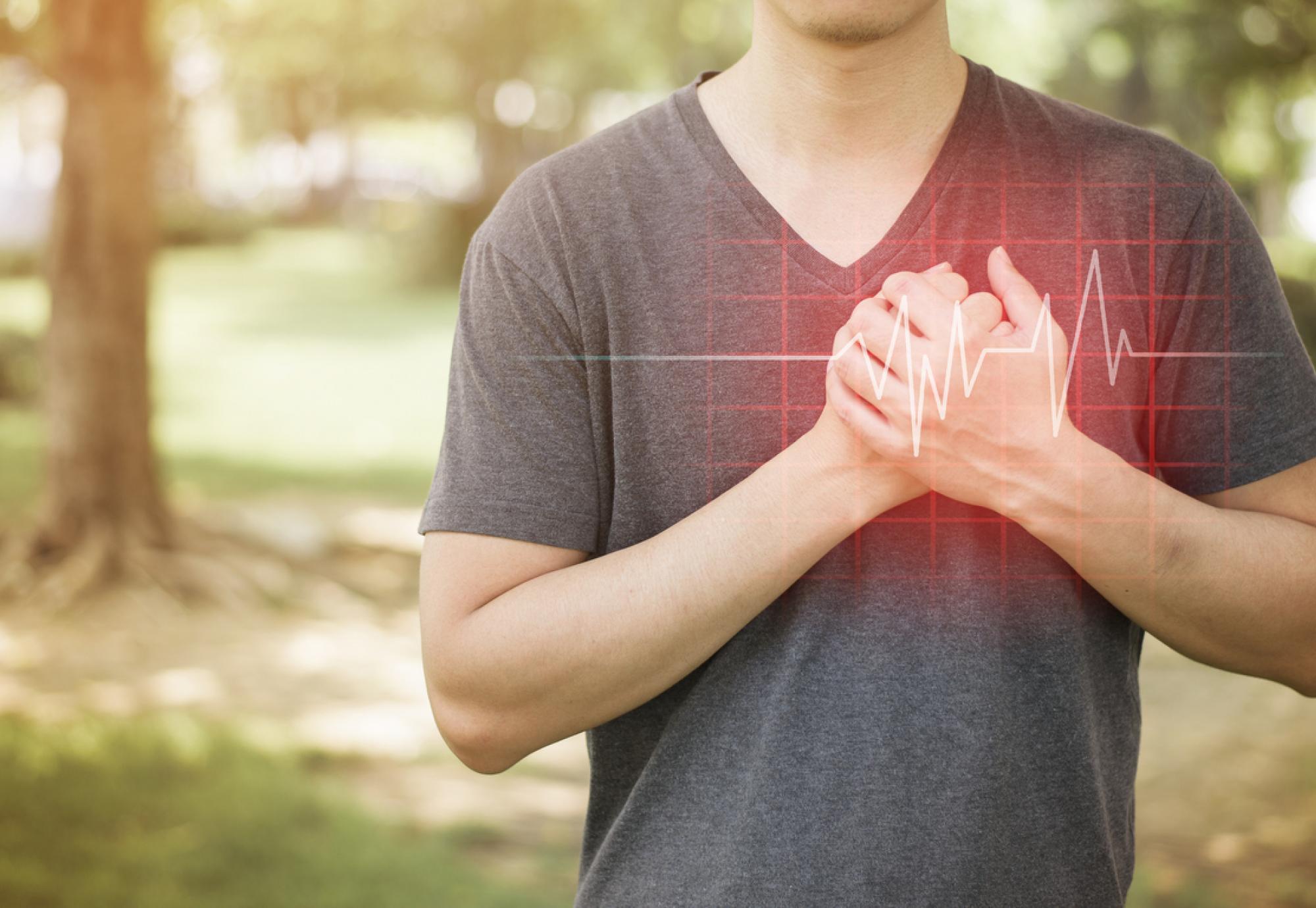 Man covering his heart