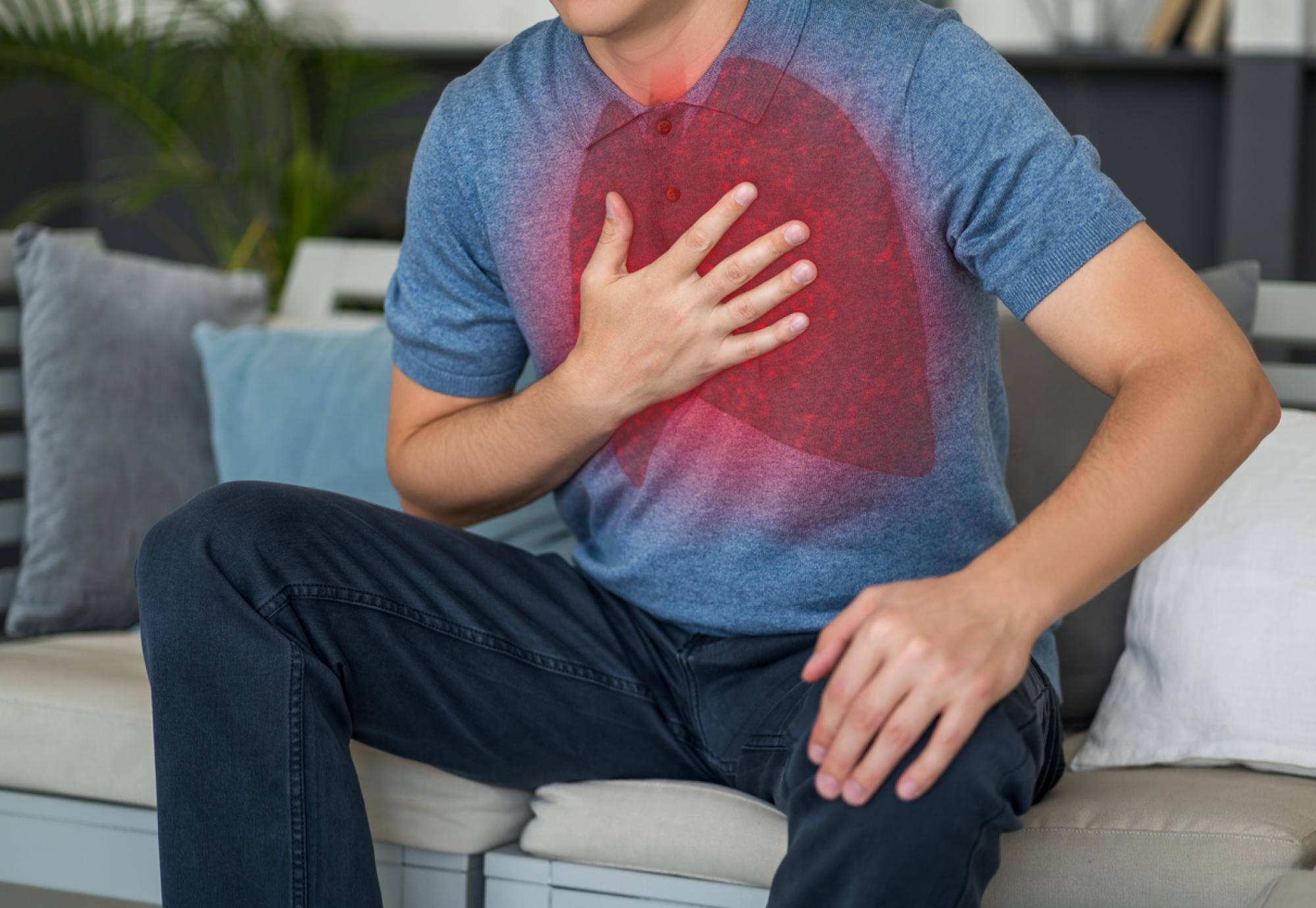 Man holding chest