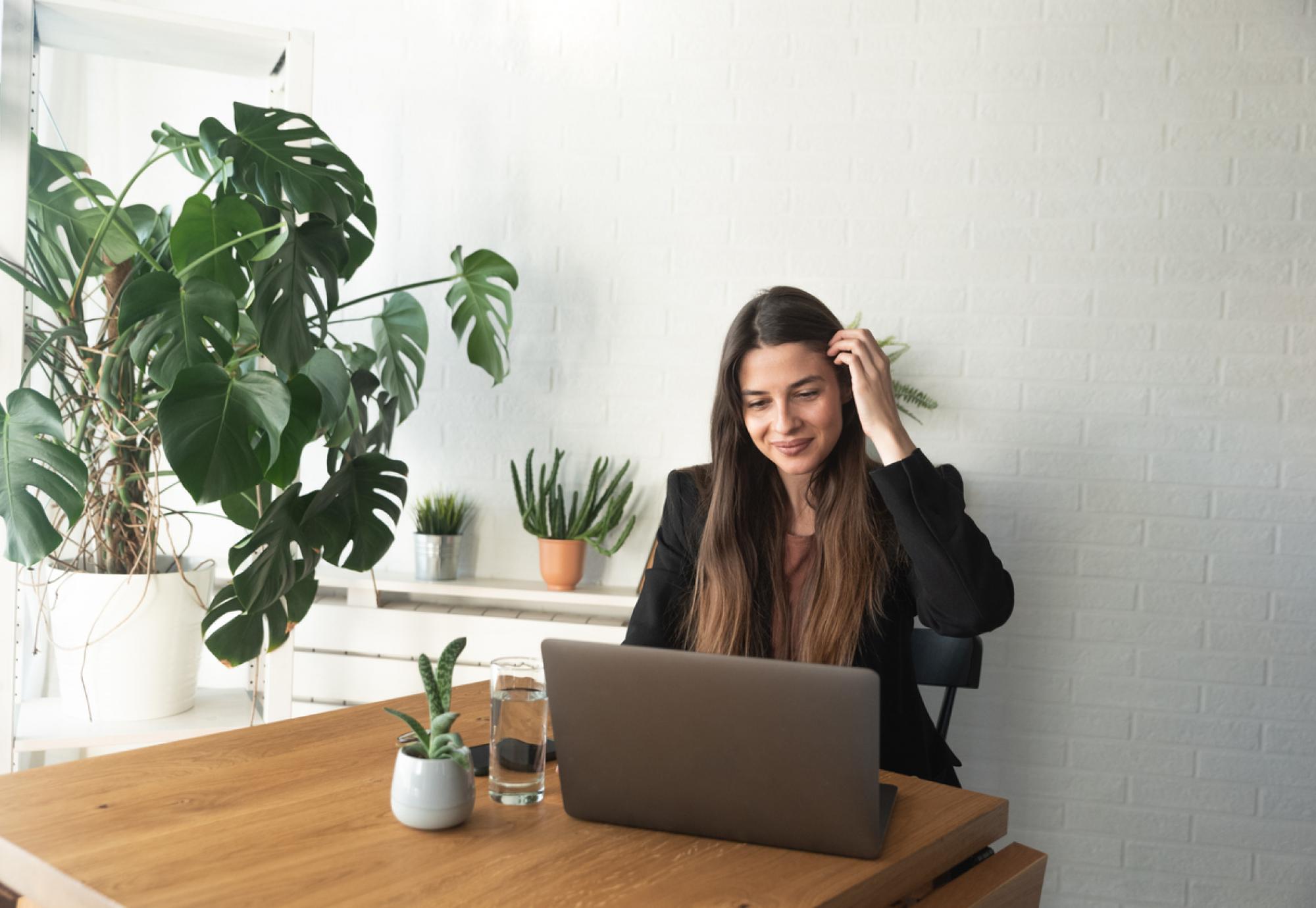 Young woman on a computer at home