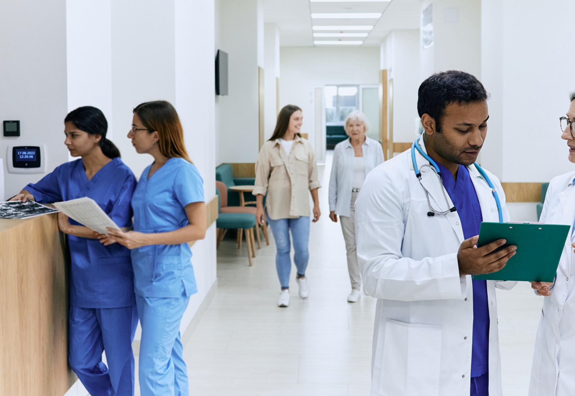 Hospital corridor with clinicians 