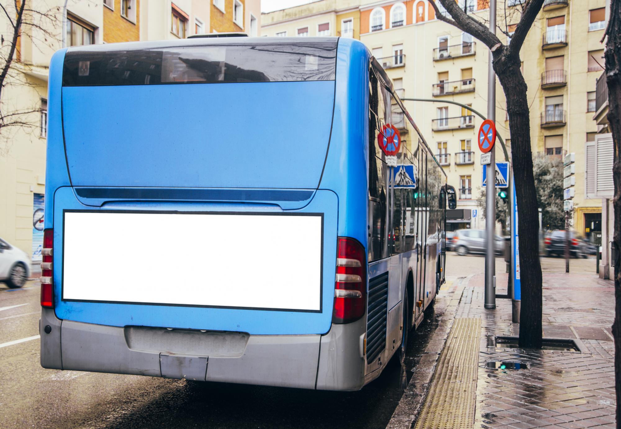 Rear-view shot of a blue bus
