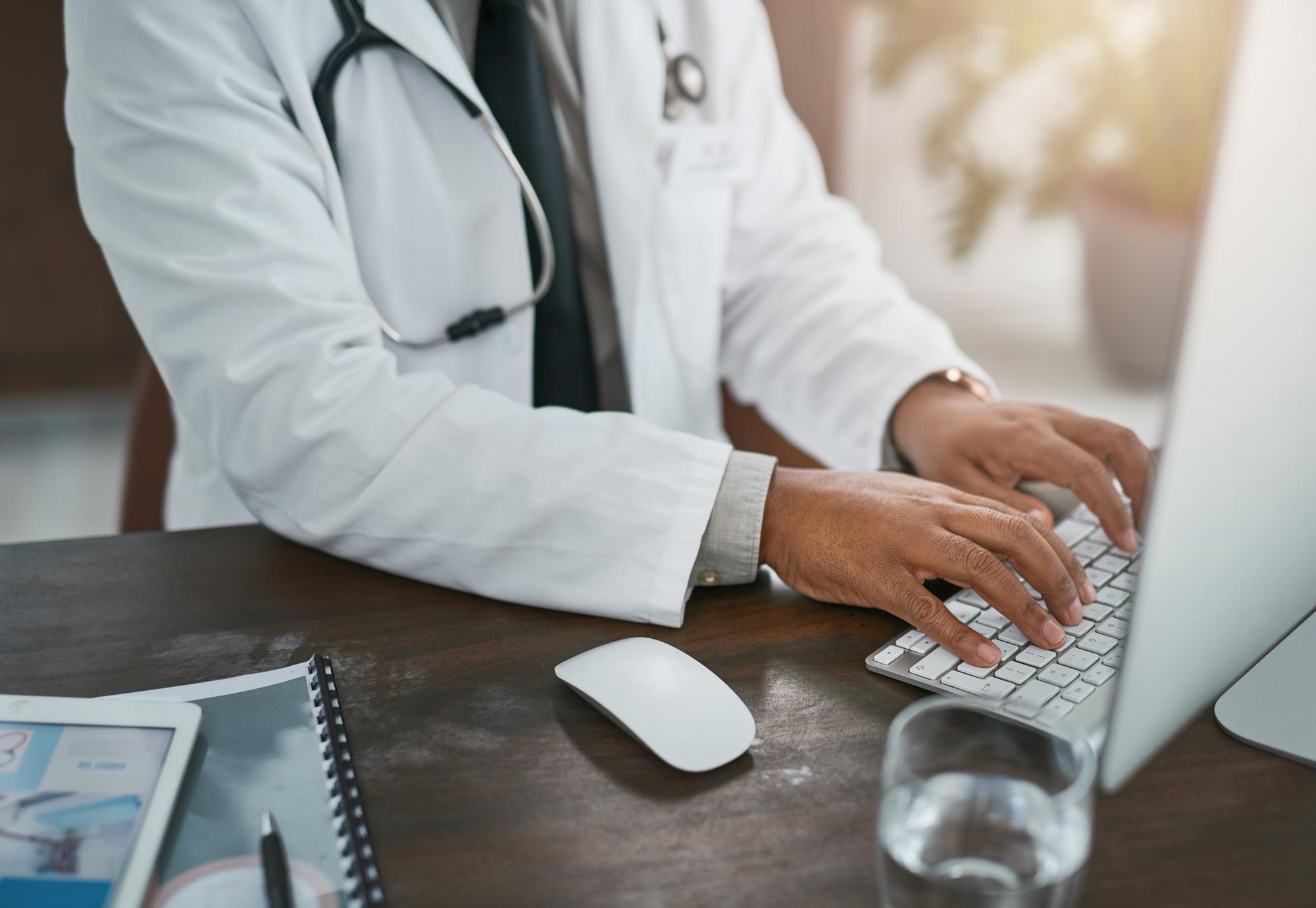 physician at desk, via Istock 