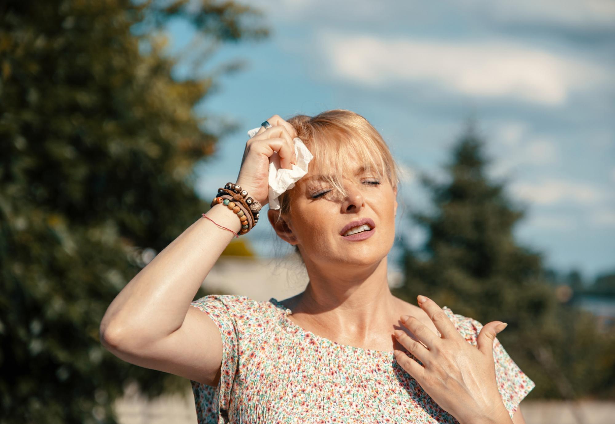 Woman experiencing extreme heat