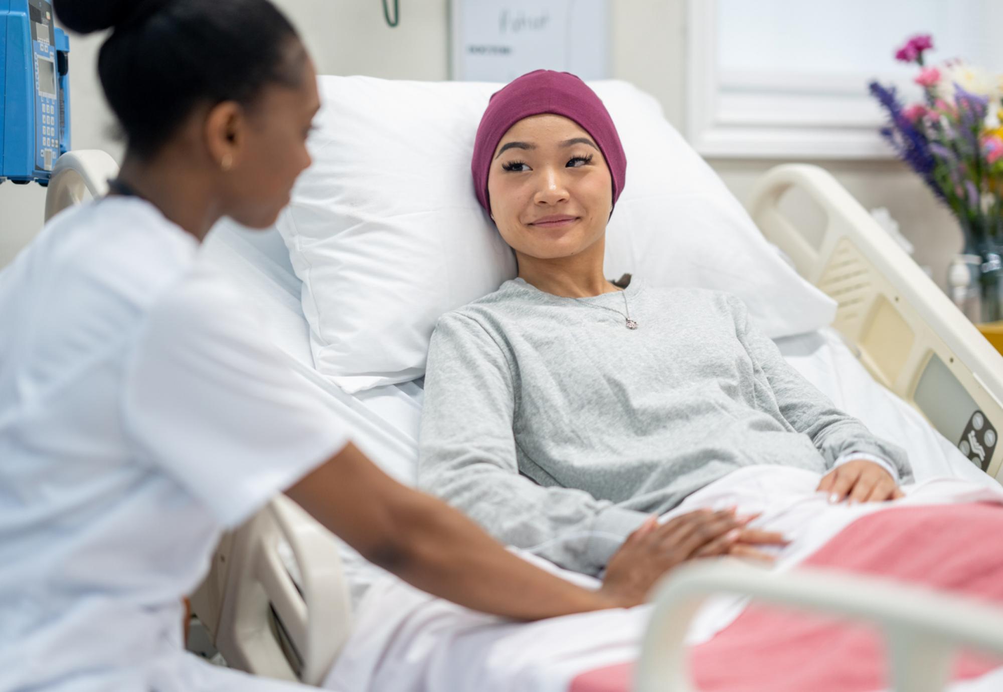 Patient in bed depicting cancer diagnosis