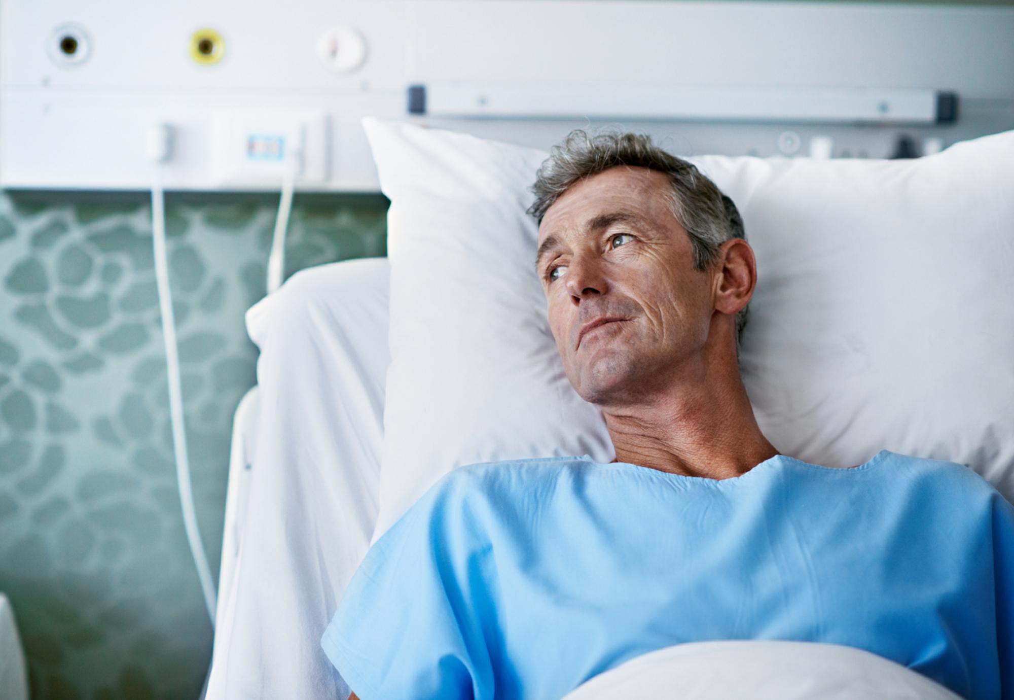 Patient in hospital bed depicting multiple long-term conditions