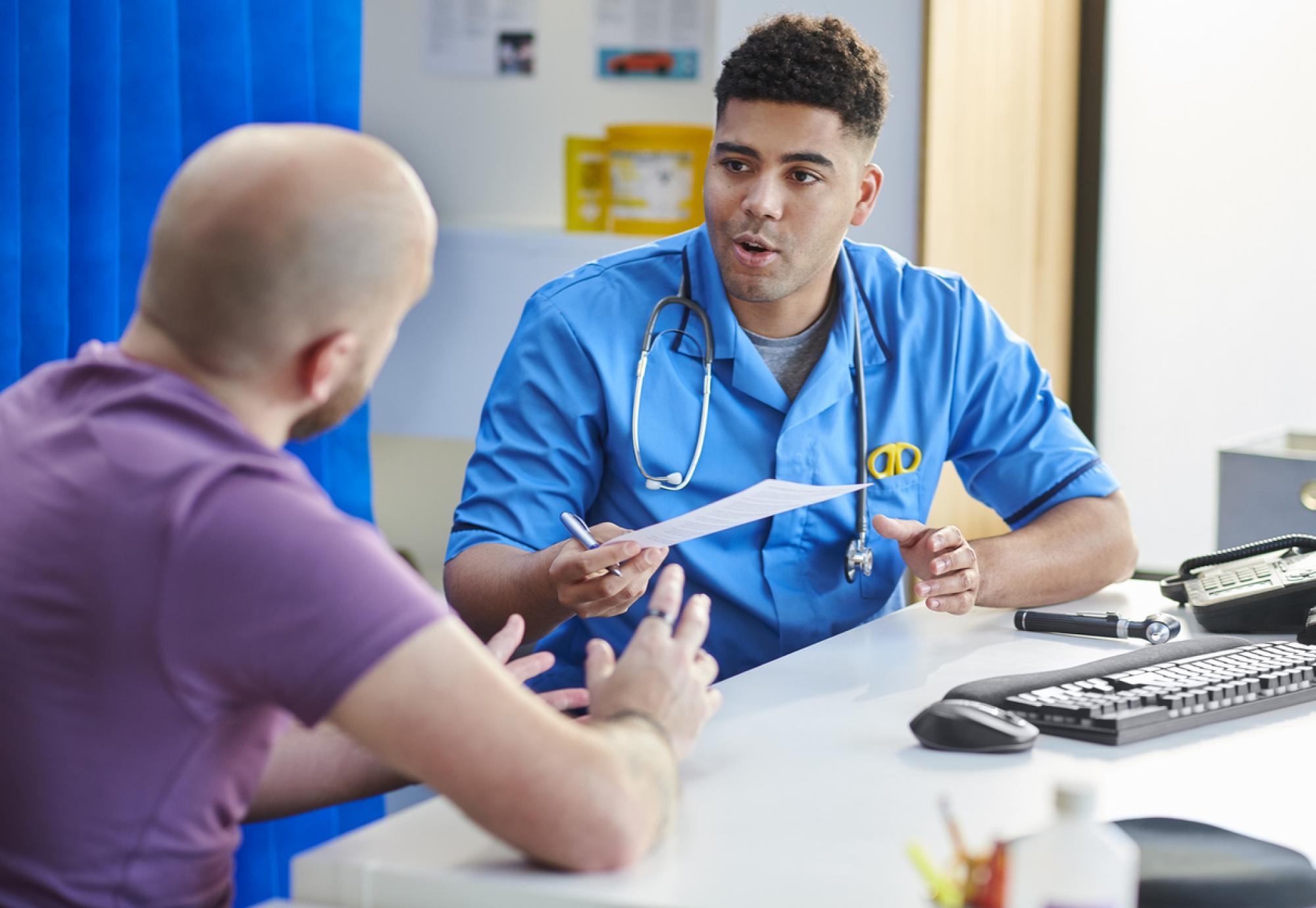 NHS doctor testing a patient