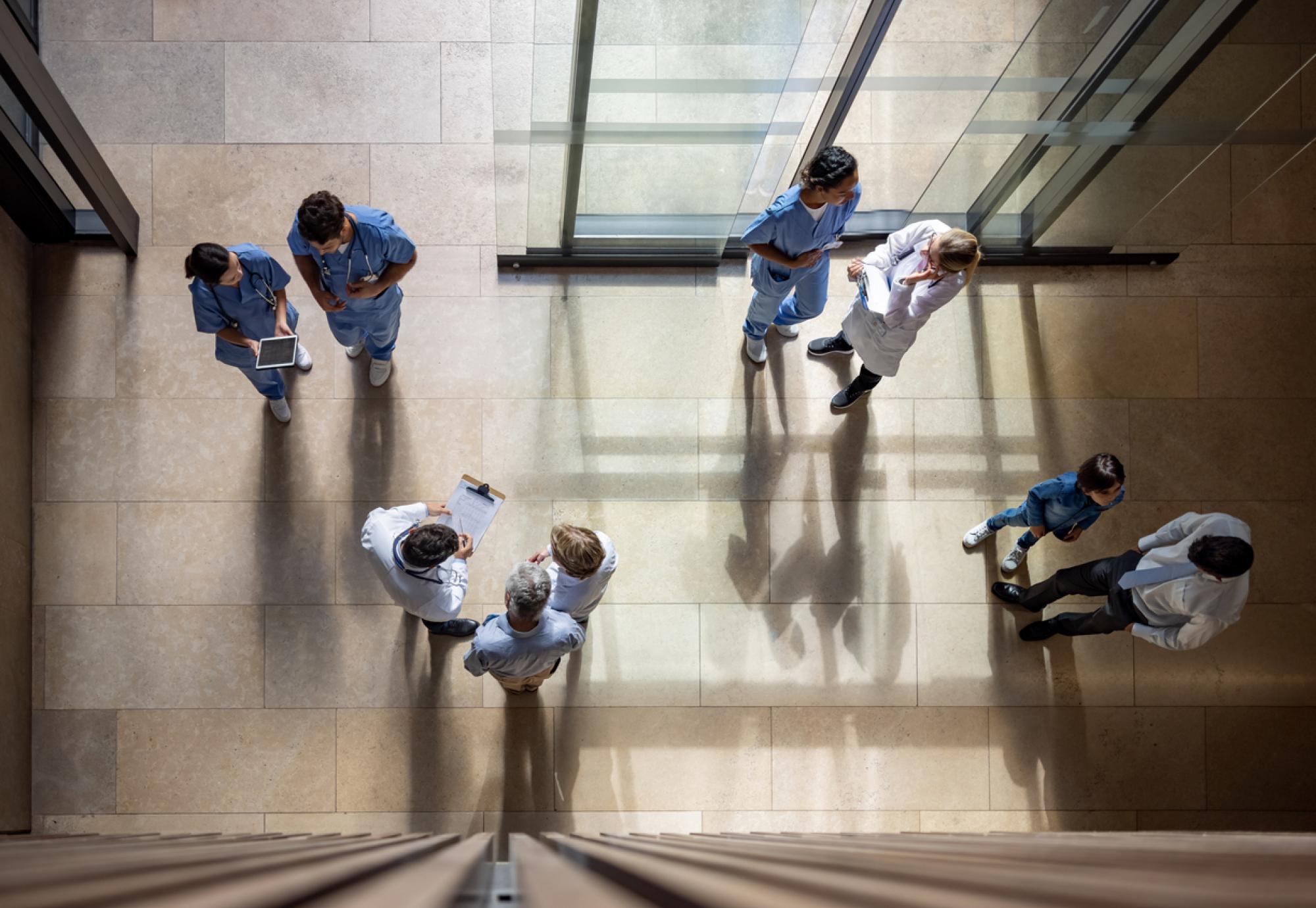 Busy hospital entrance depicting the NHS waiting lists