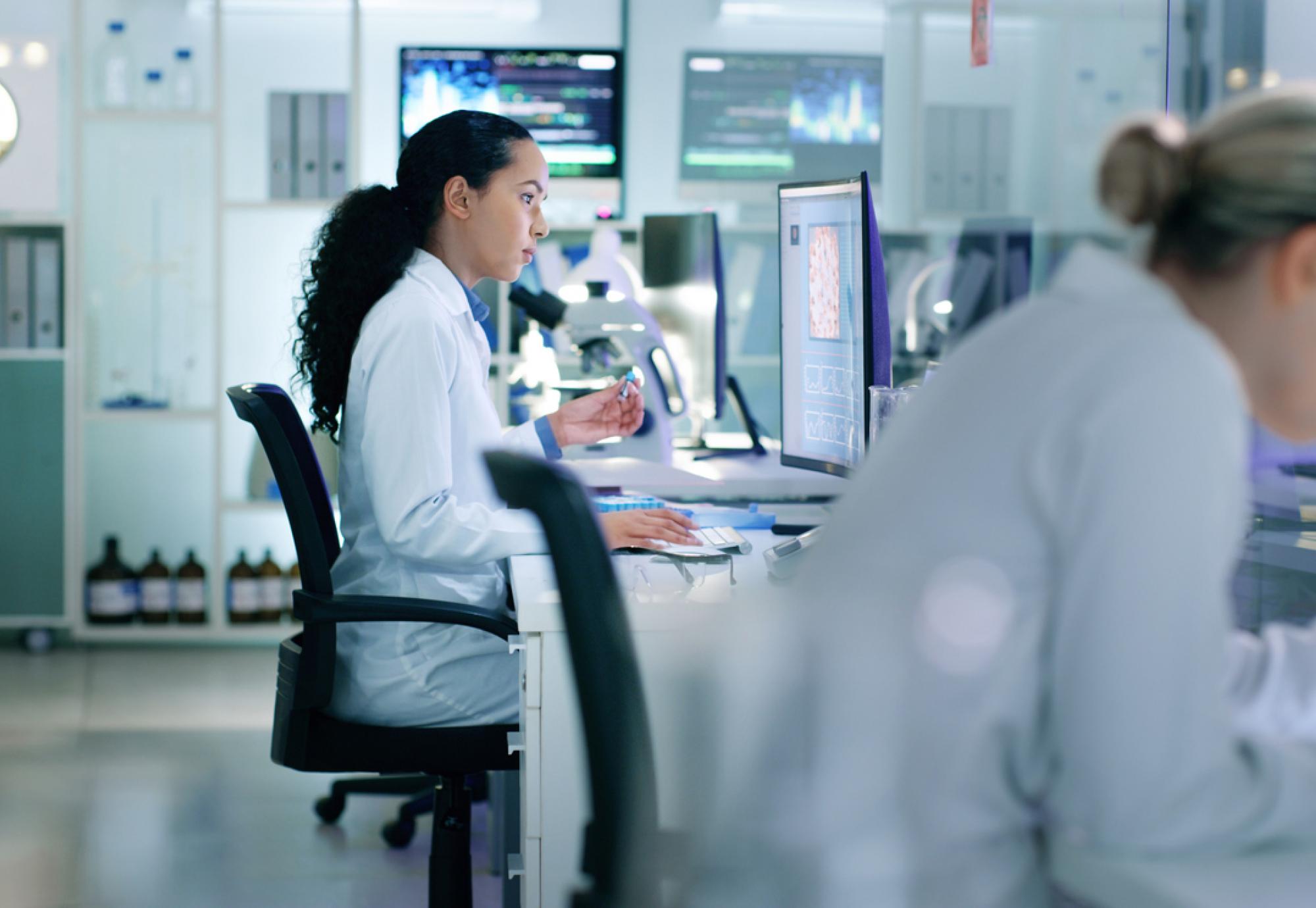 Image of scientists in a laboratory depicting MHRA's clinical trial overhaul