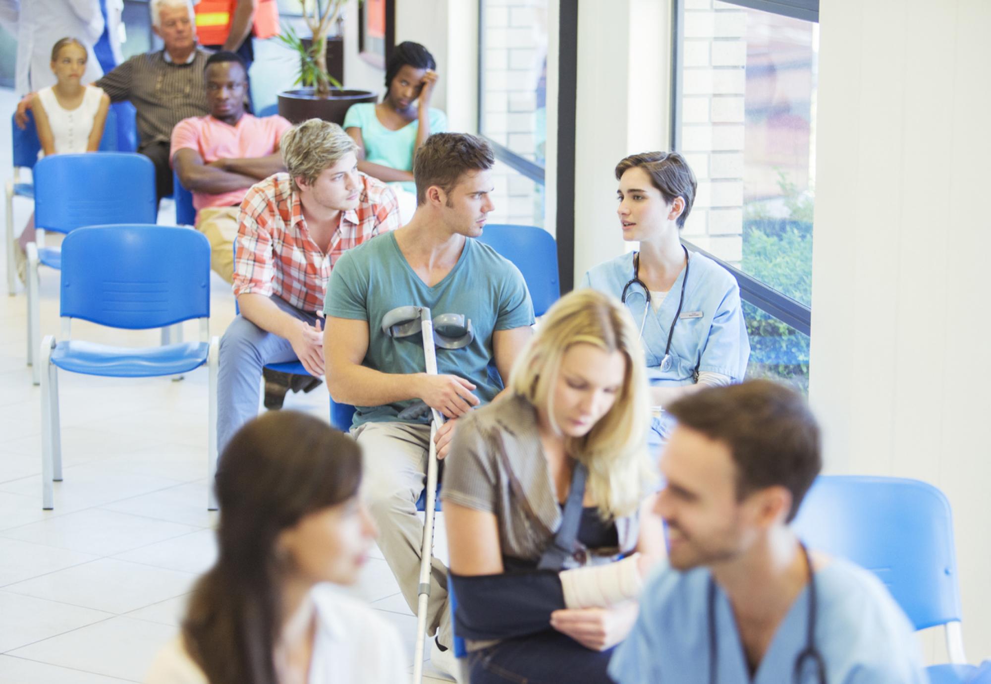 Image of a busy hospital waiting room depicting the NHS Scotland waiting lists