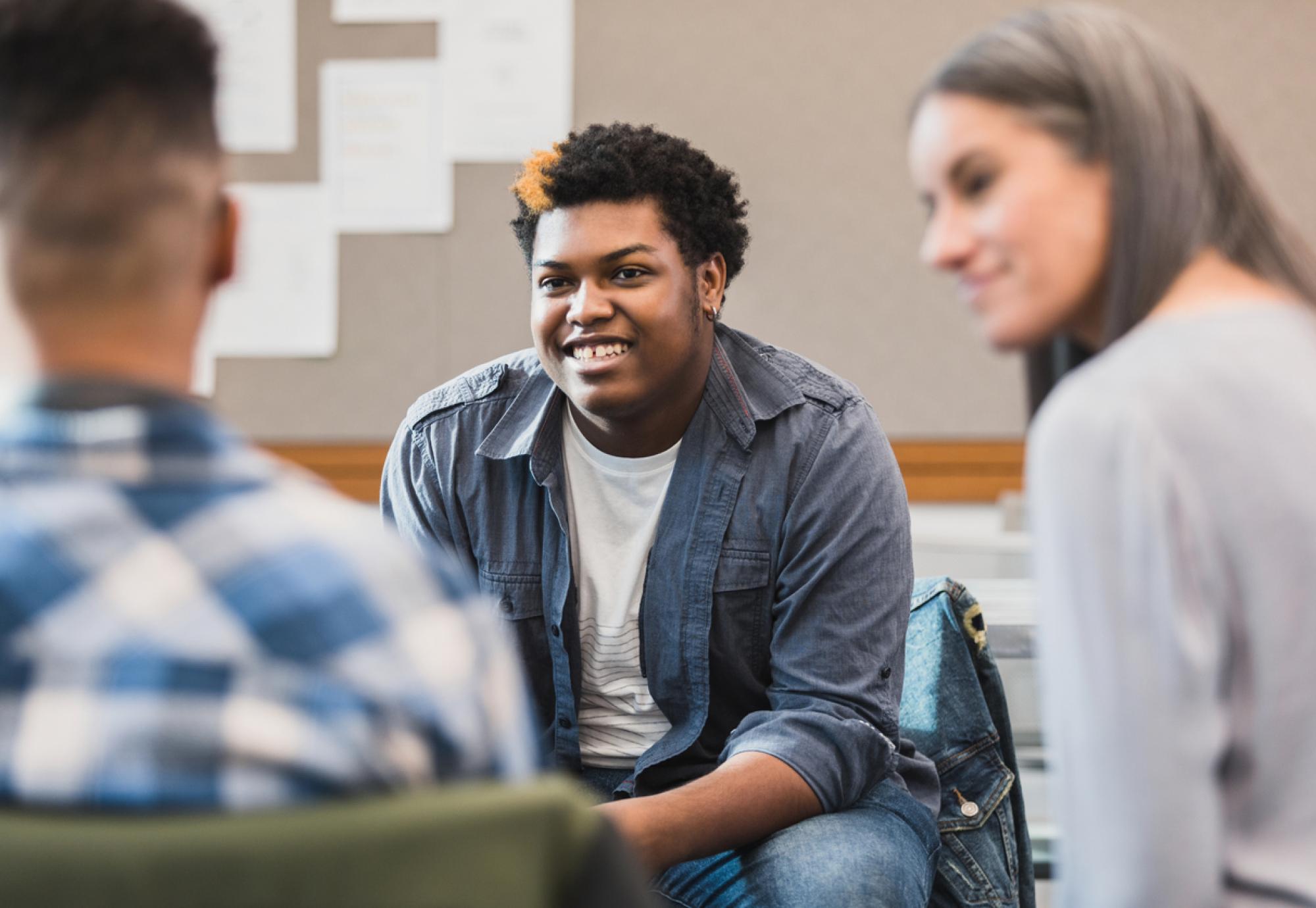 Image of a youth mental health meeting depicting the new government support