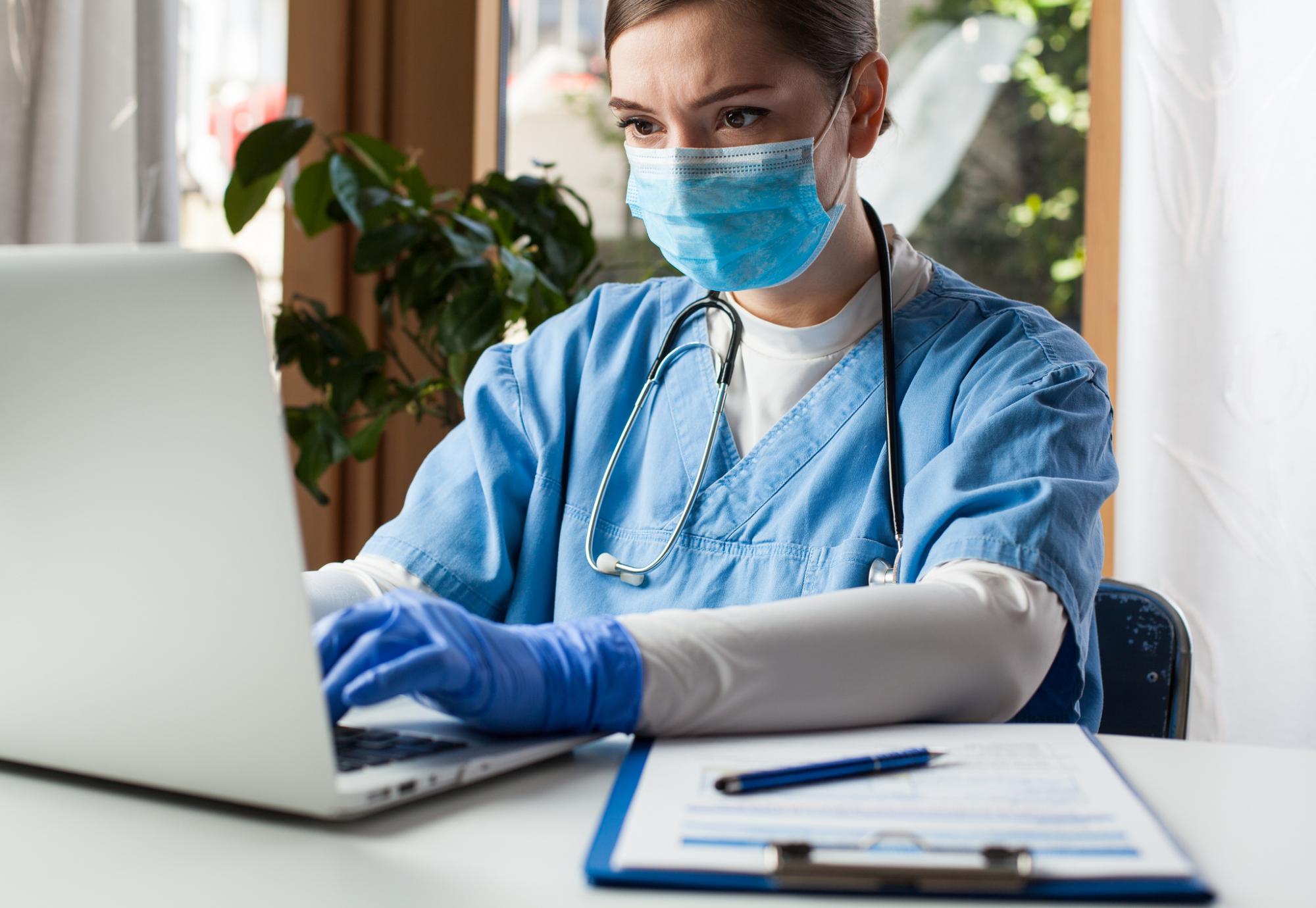 Nurse using computer