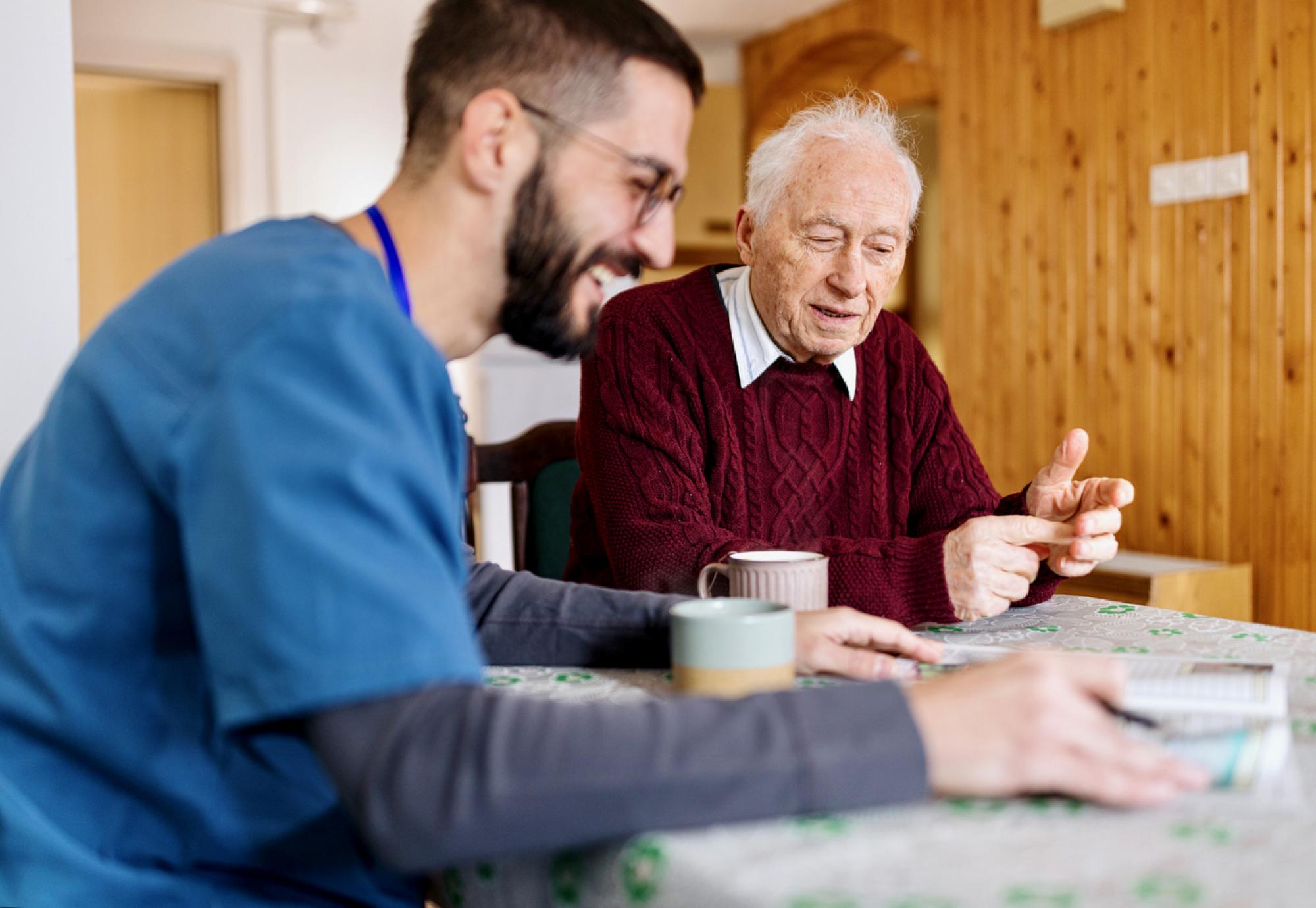 Health professional caring for a patient at home