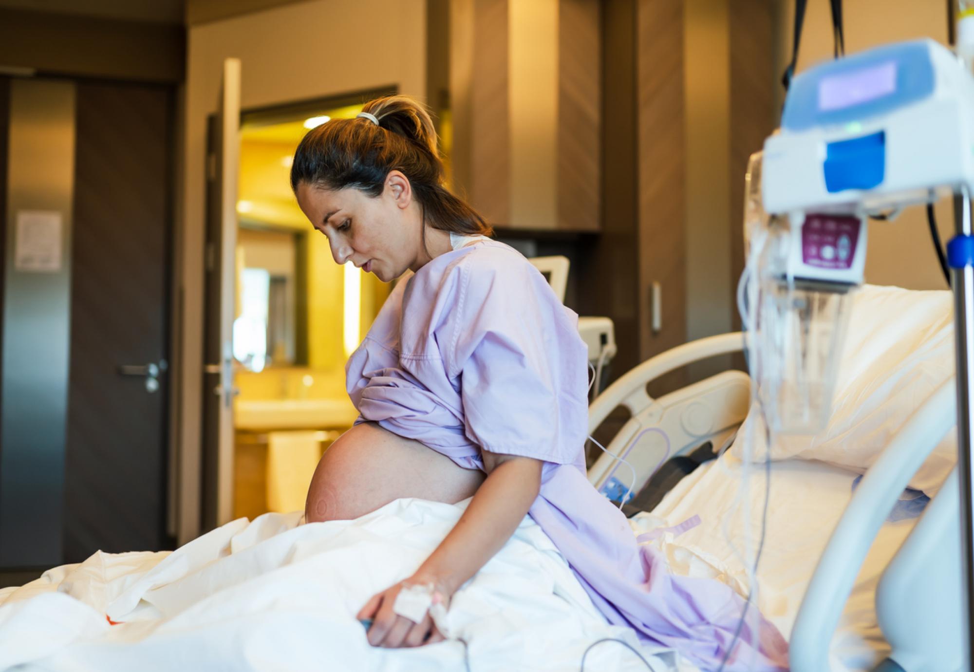 Young pregnant woman in the hospital ward