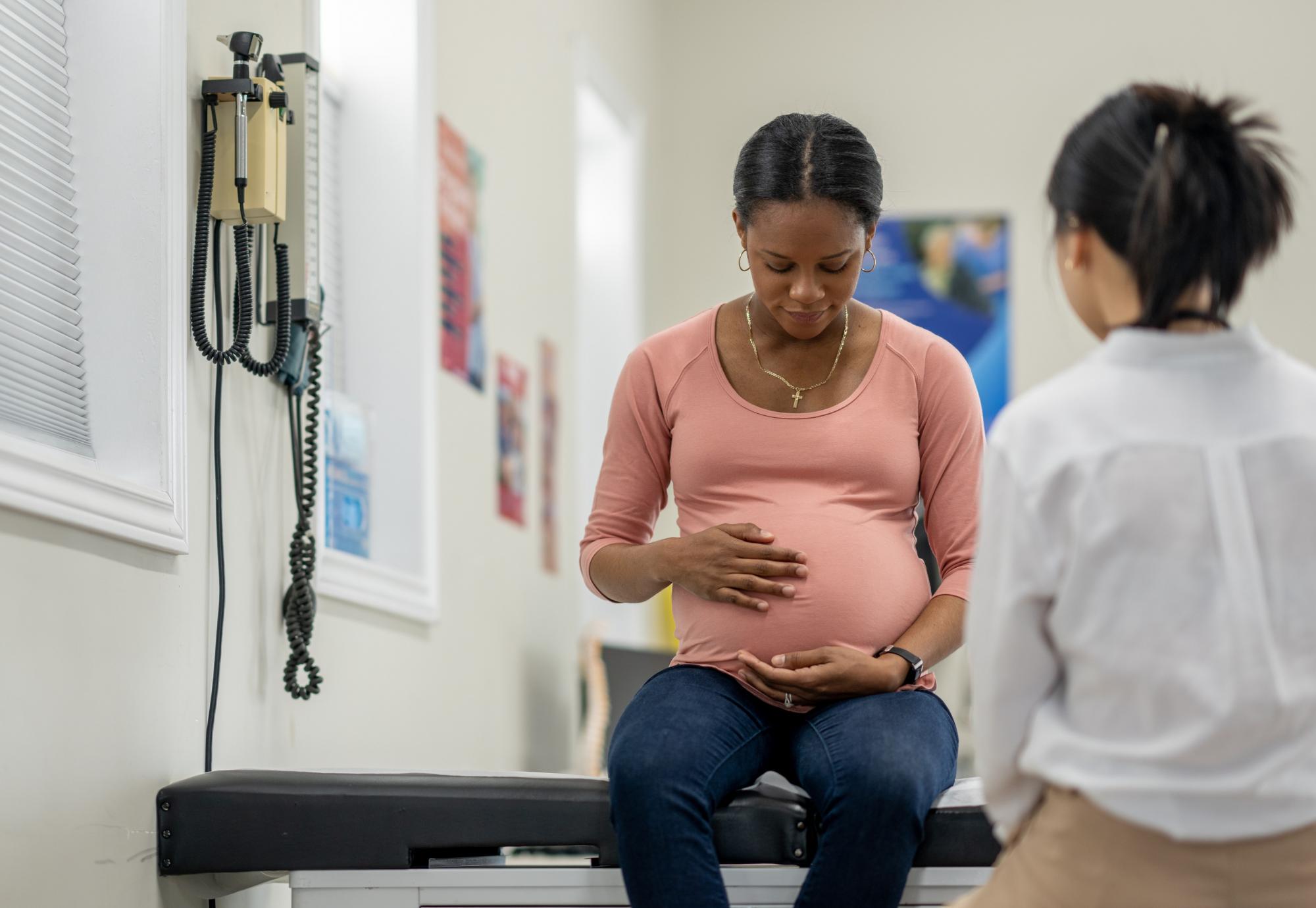 Pregnant mother receiving maternity care