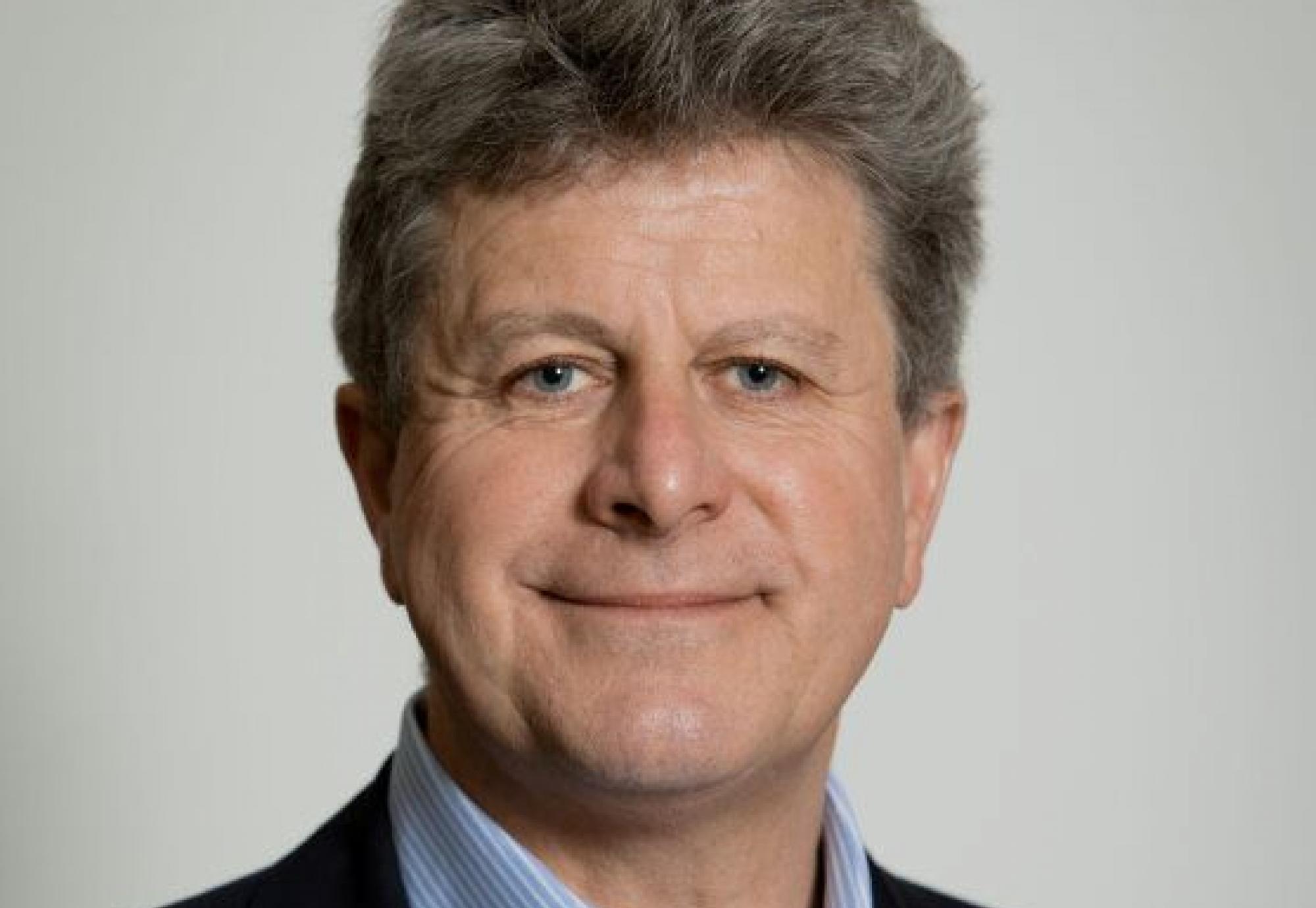 Dr Adrian James