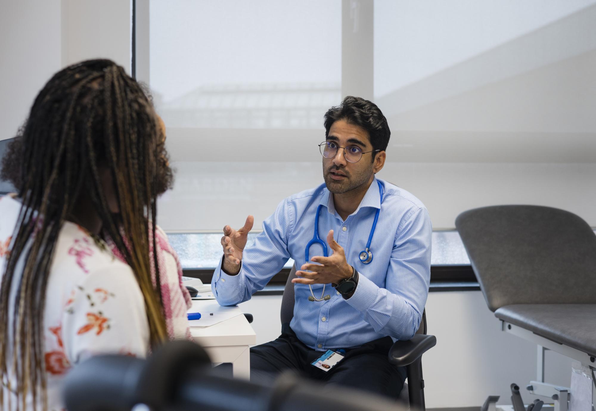 Doctor talking to a patient
