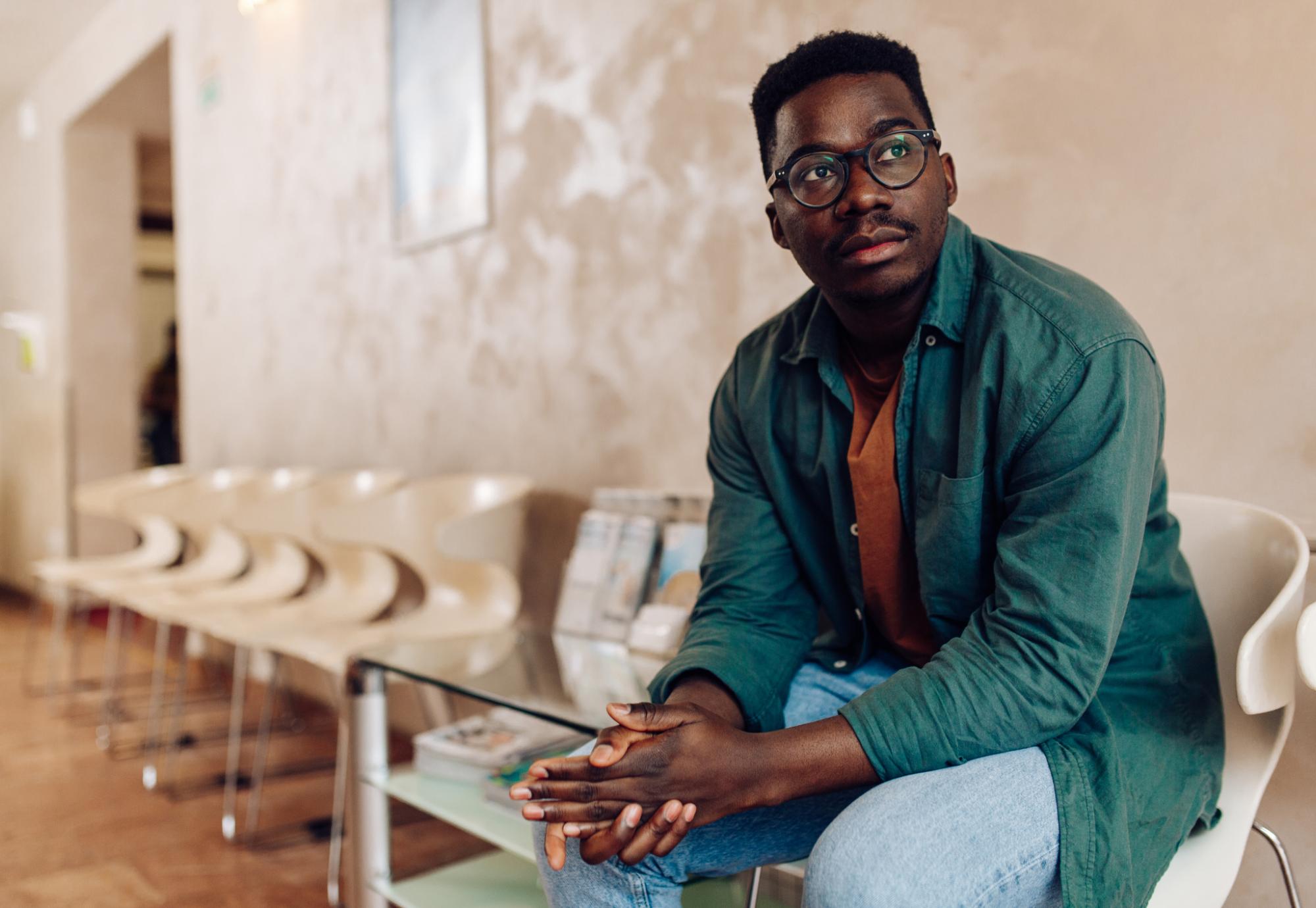 Black man in waiting room