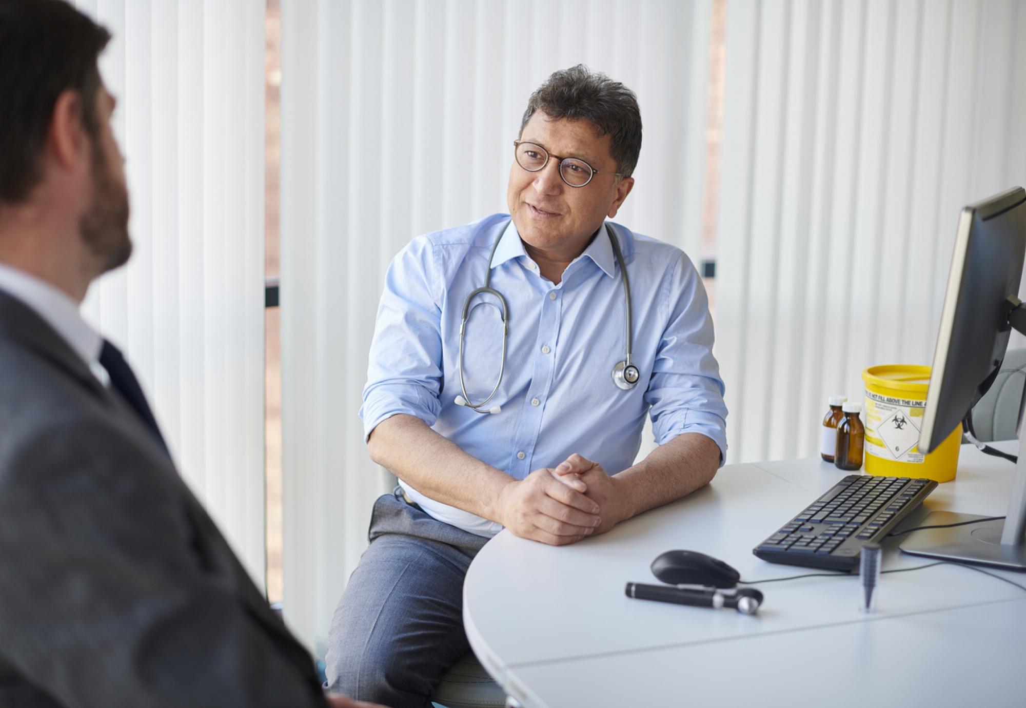A GP listening to a sales pitch