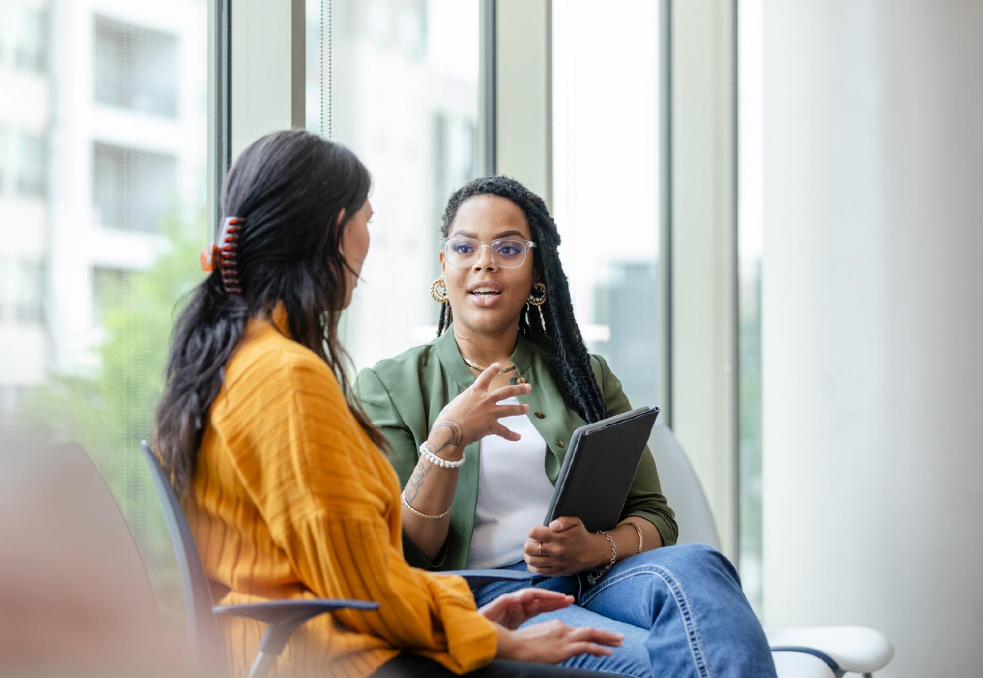 client listens to therapist about mental health