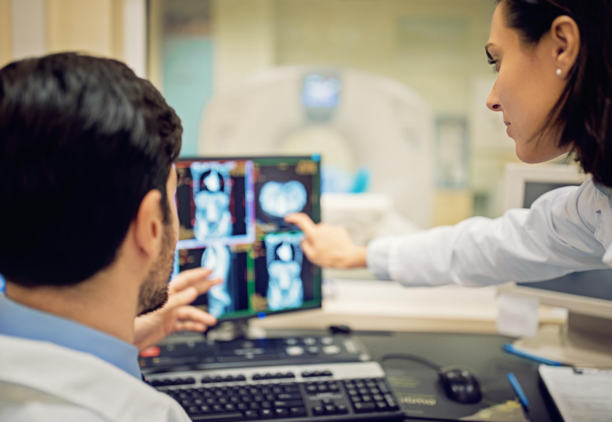 Doctors with a CT scan