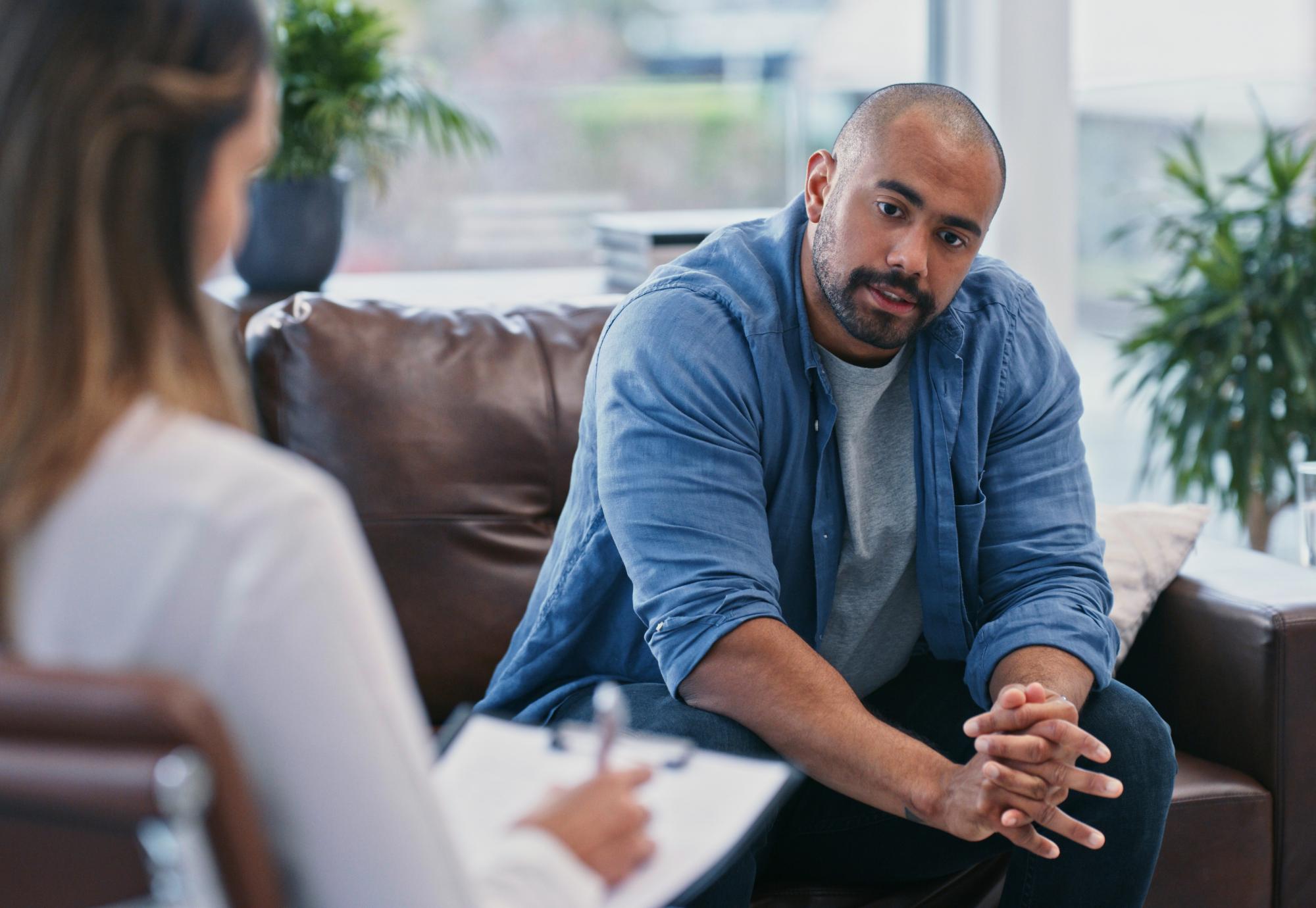 Man talking to a therapist