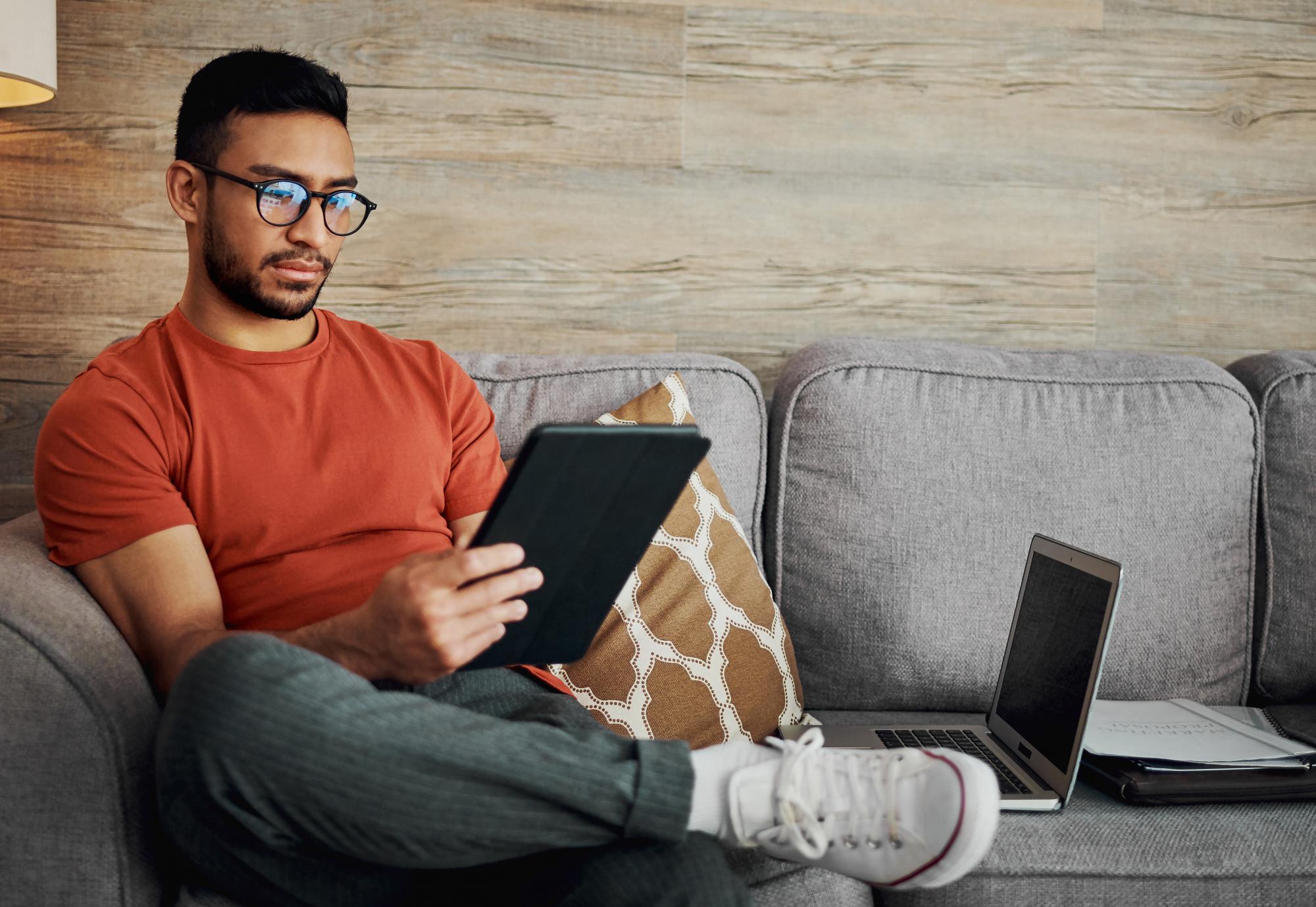 Man using an ipad at home