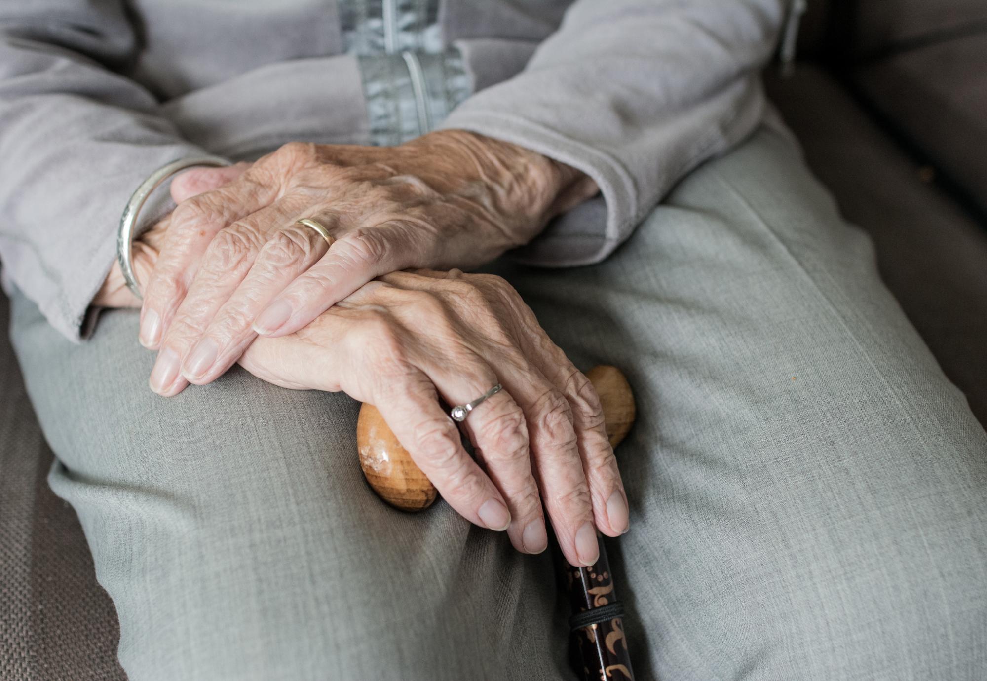 An elderly person's hands