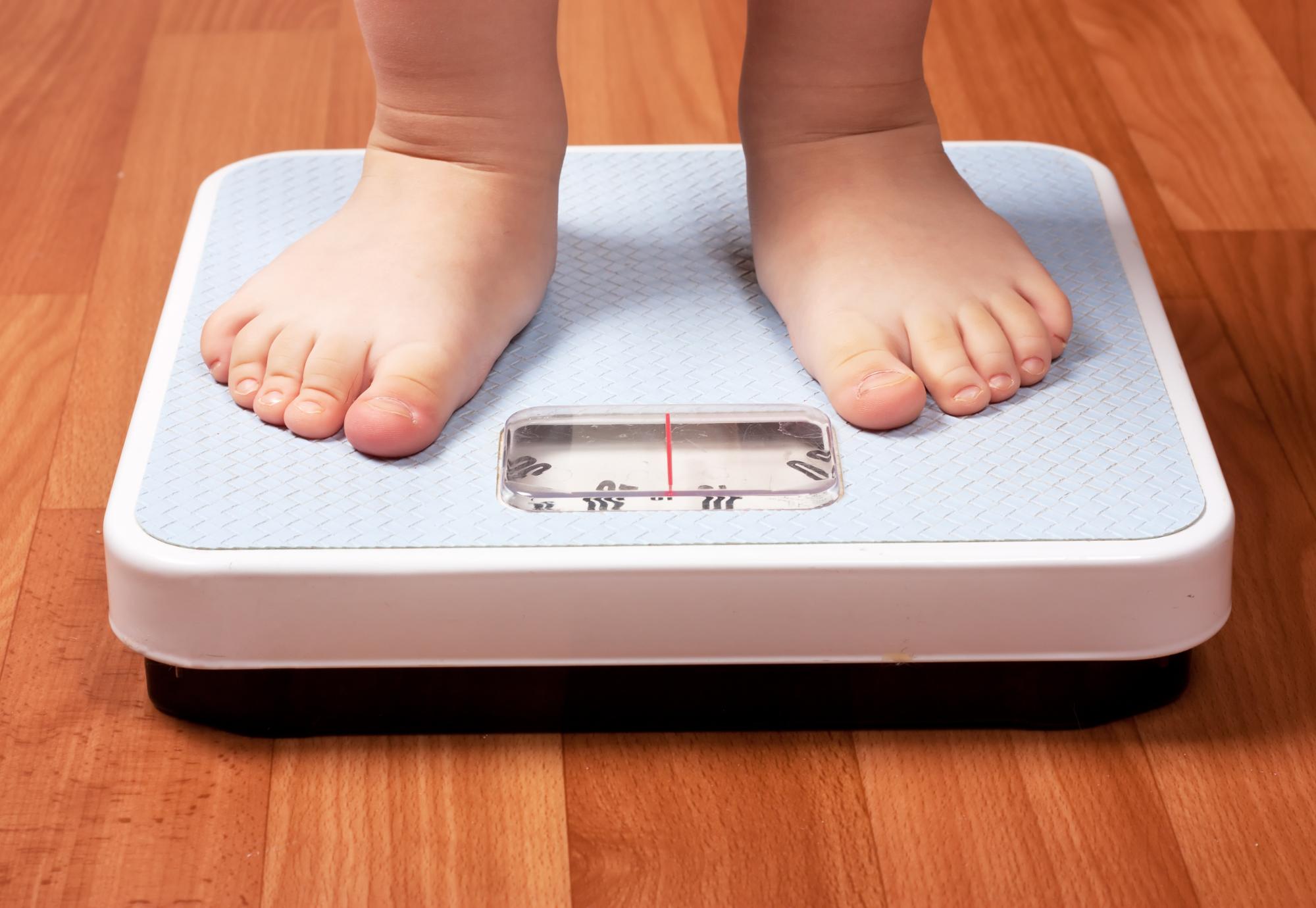 Child on a weighing scale