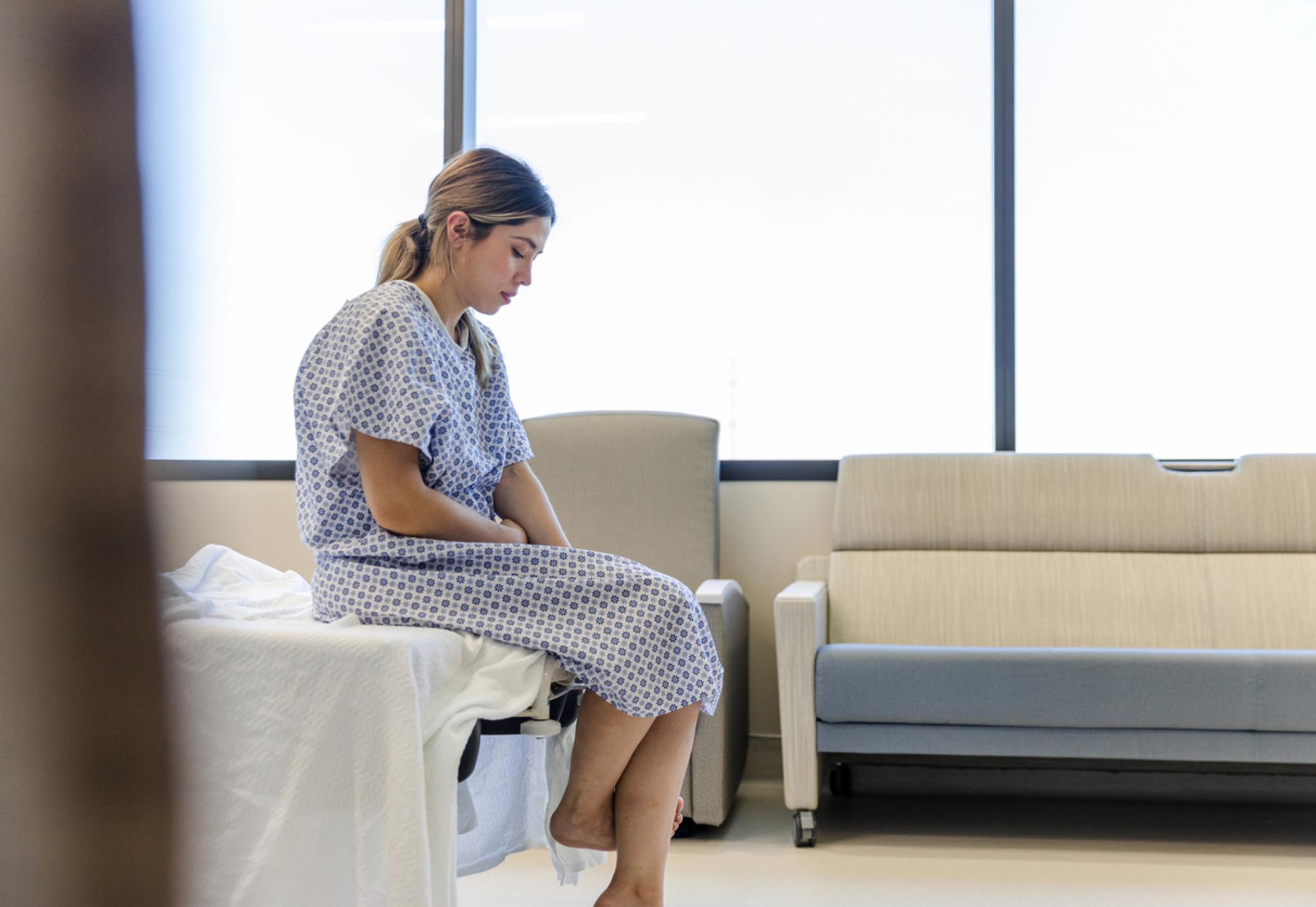 Woman upset after suffering miscarriage
