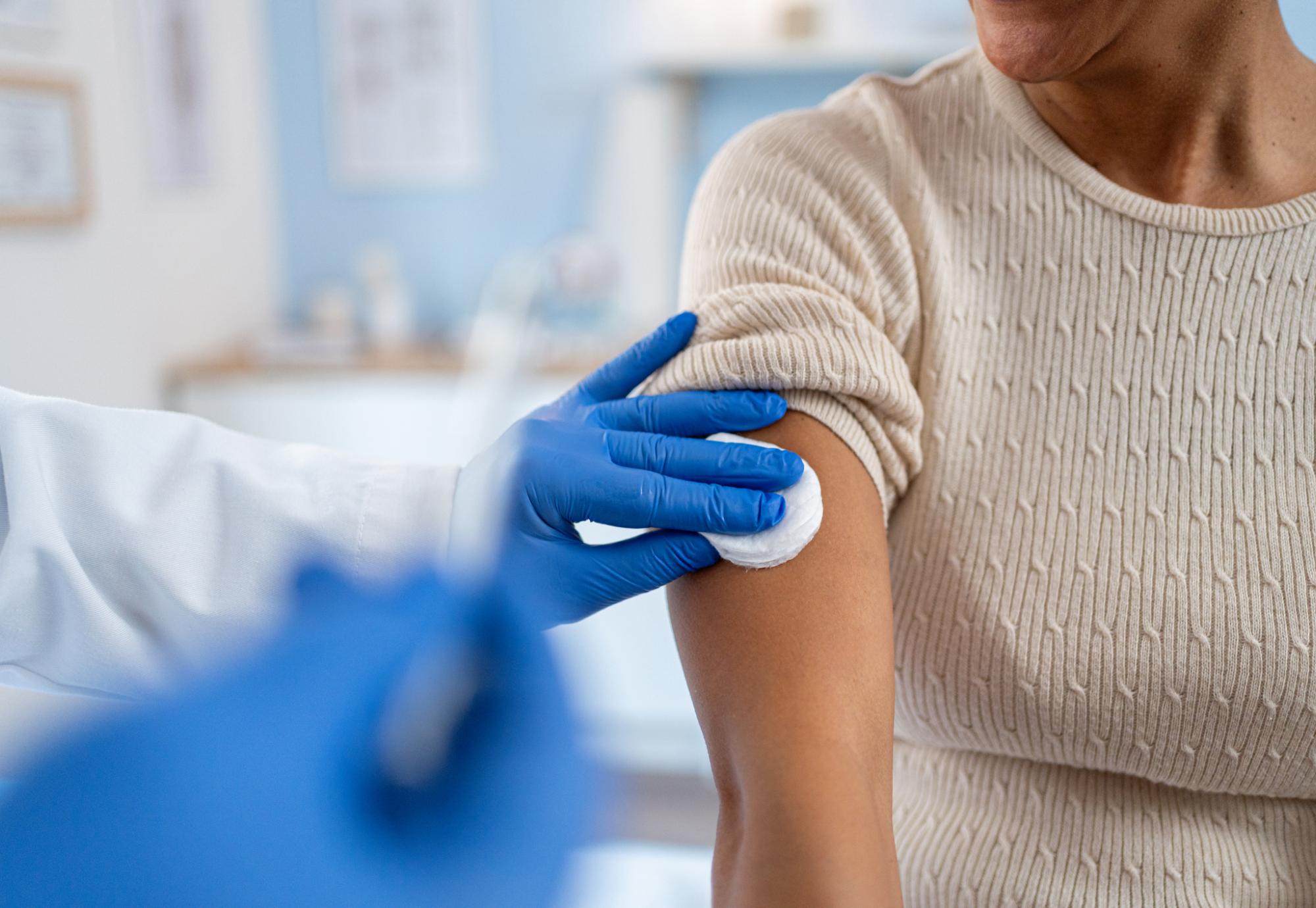 Woman being vaccinated