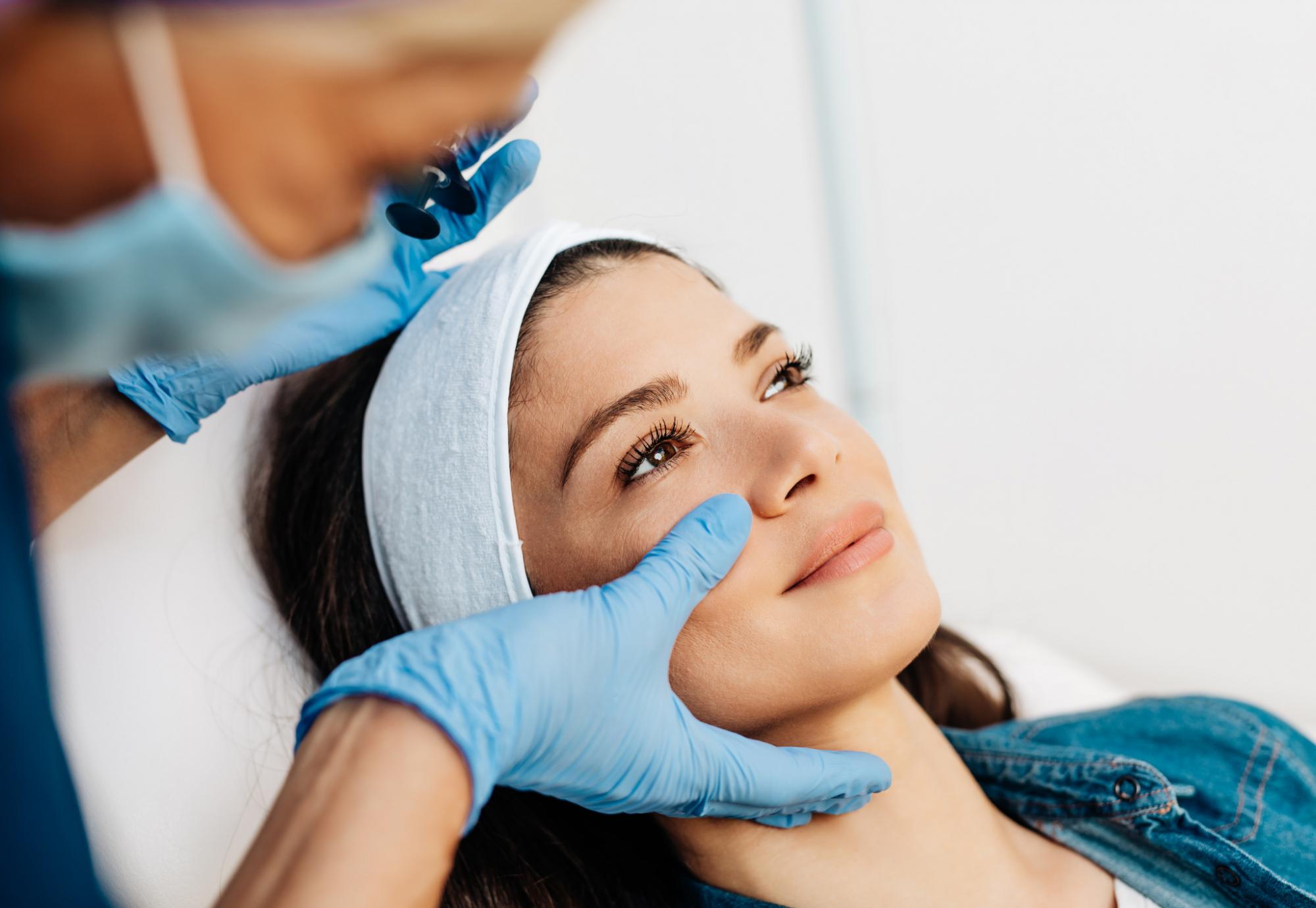 Young woman undergoing a cosmetic procedure