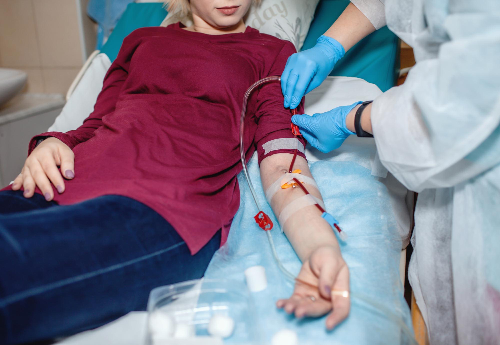 Young girl undergoing hemodialysis