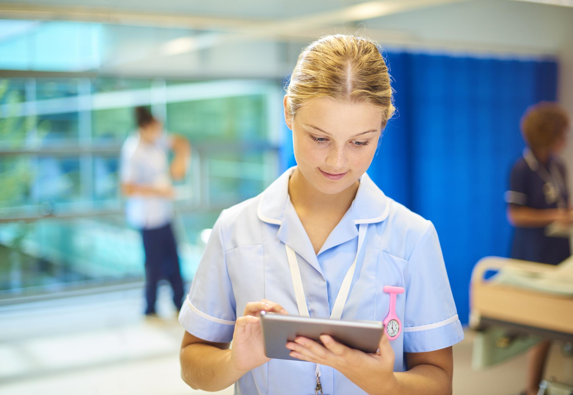 young nurse using a tablet