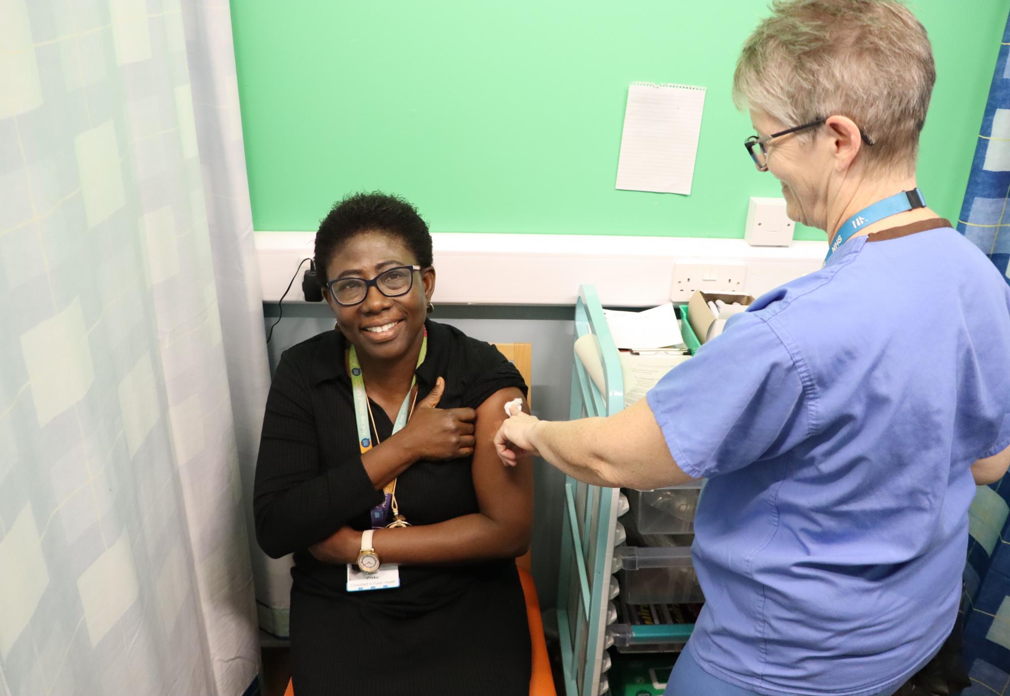 Esther Mireku, public health consultant, having a flu vaccine recently