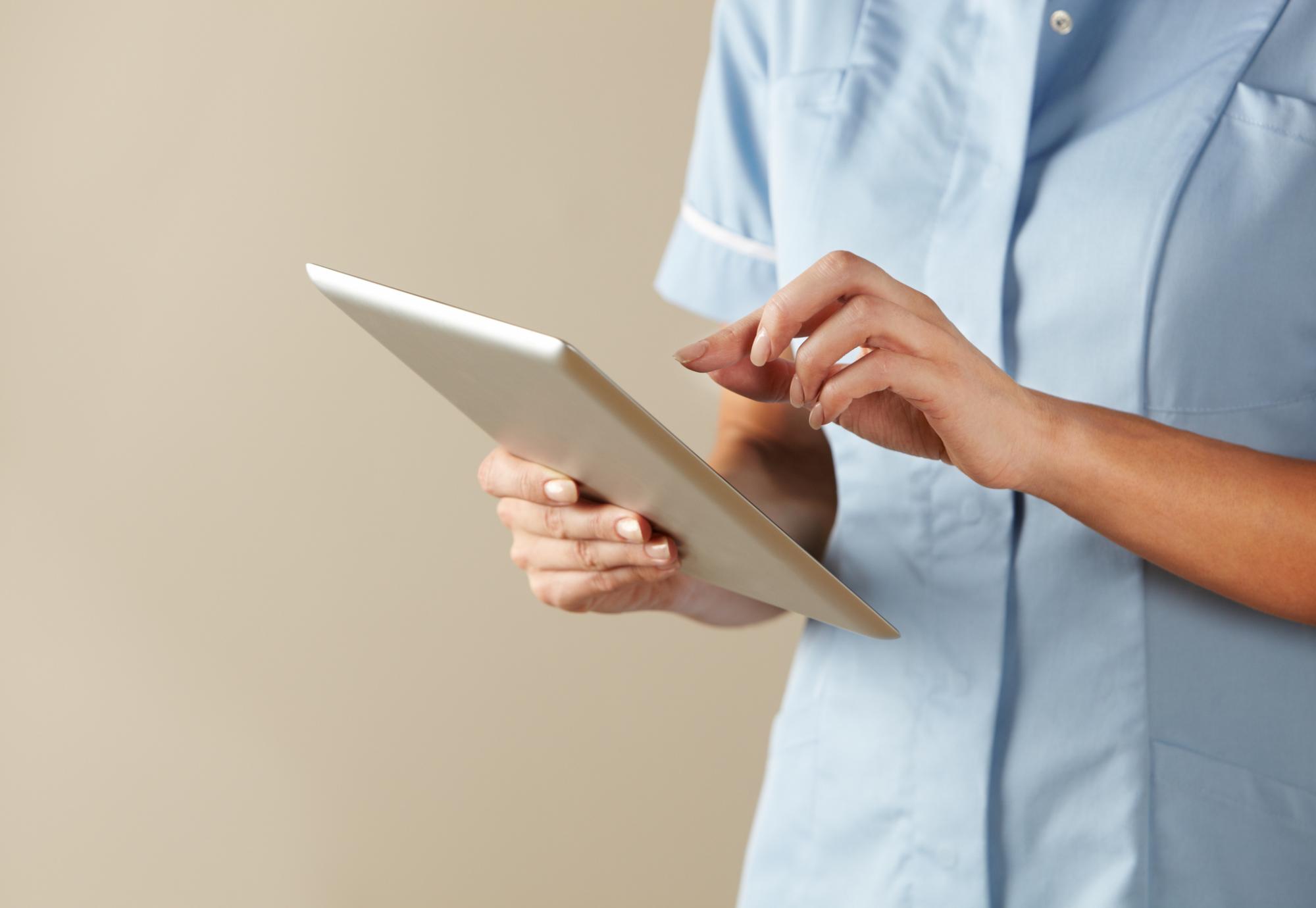 Nurse using tablet