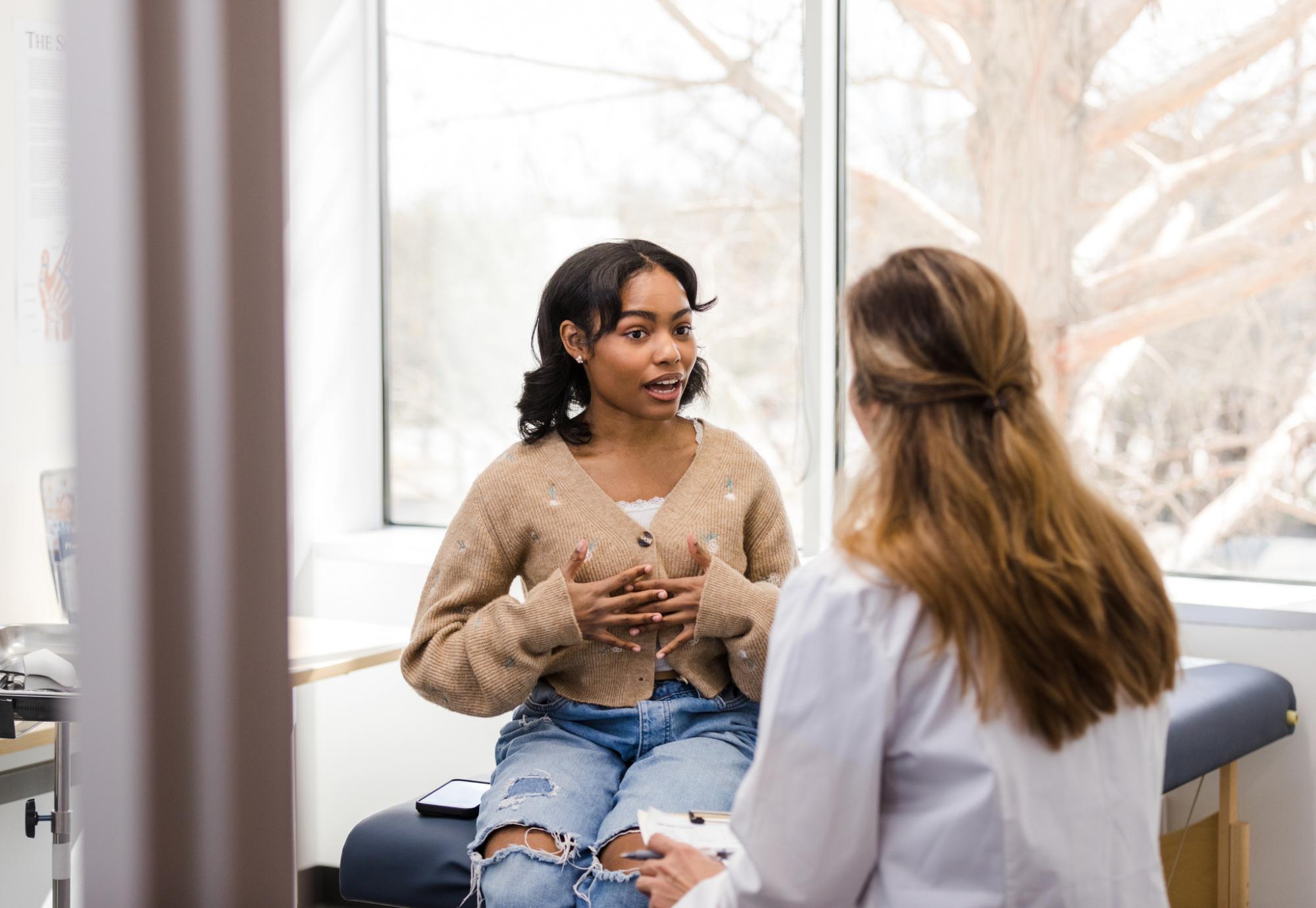 Teenager talking to therapist