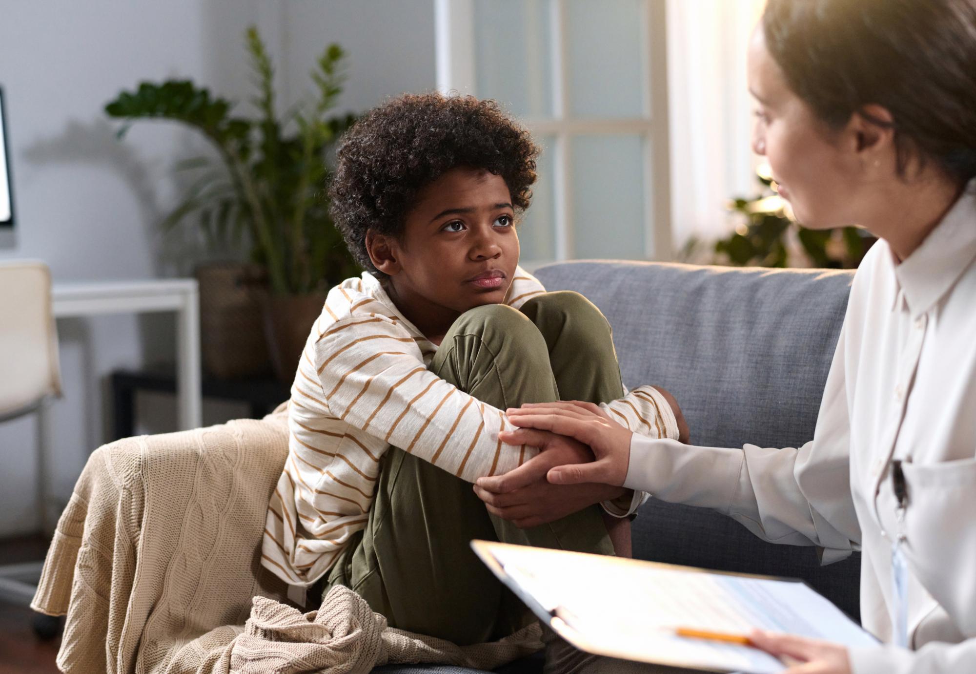 Young boy receiving mental health support
