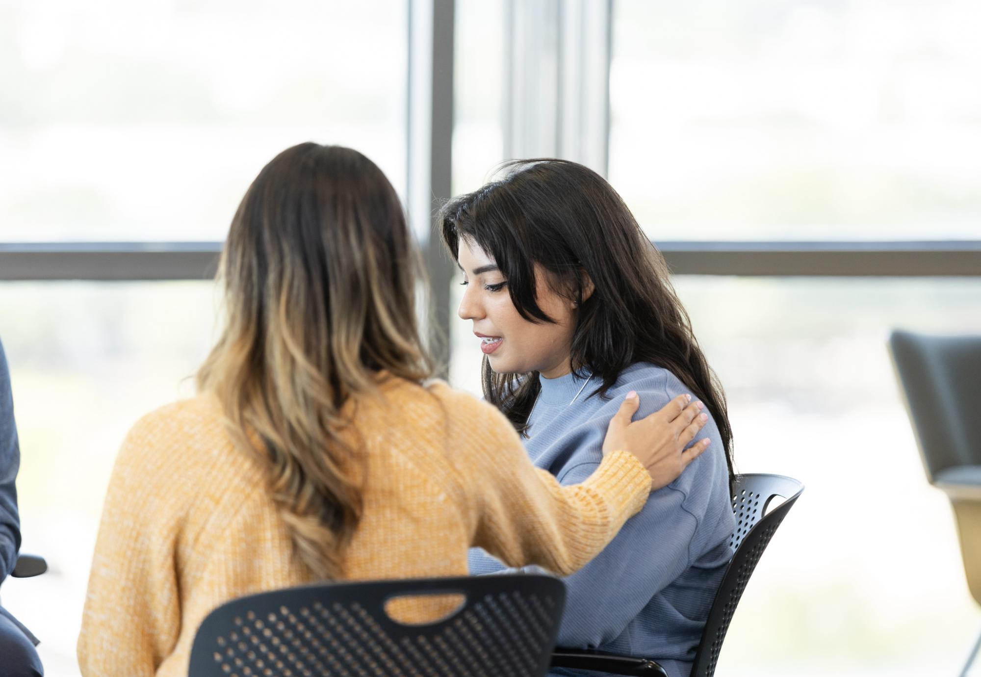 Woman being supported with her mental health