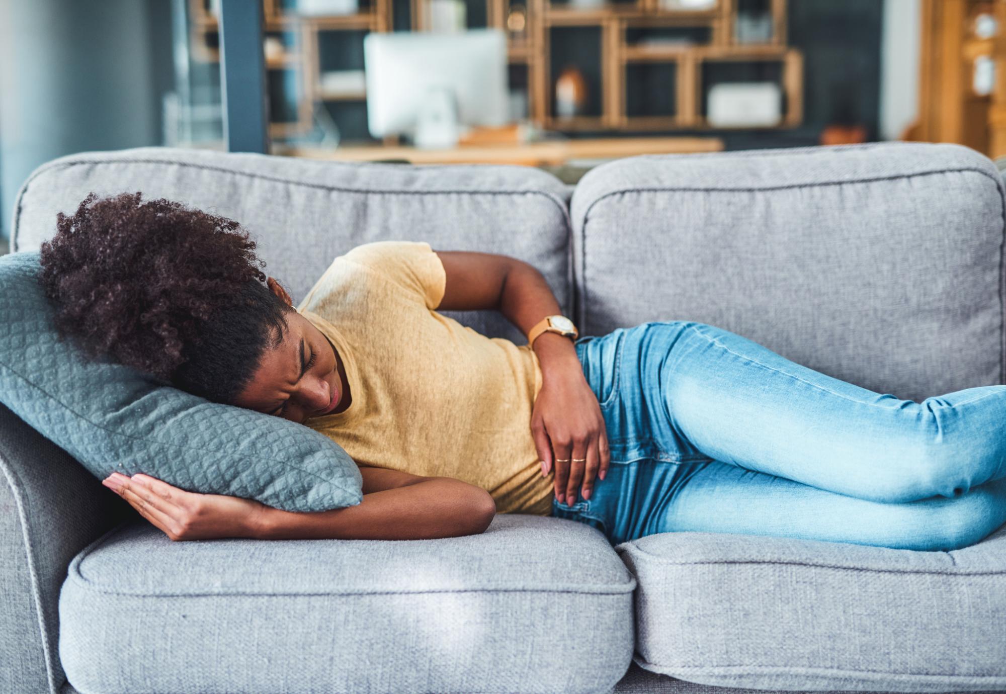 Woman suffering with endometriosis