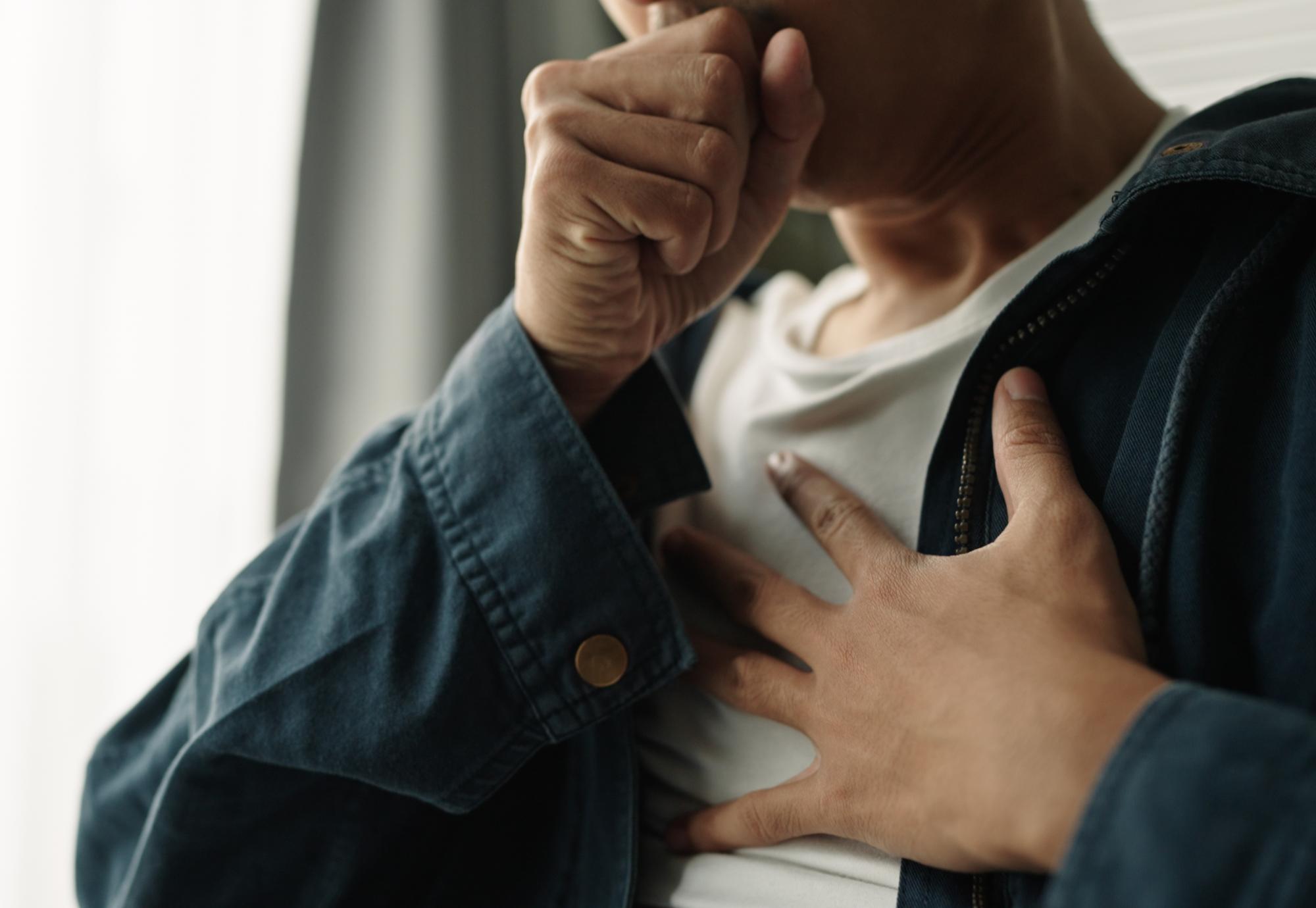 Man coughing