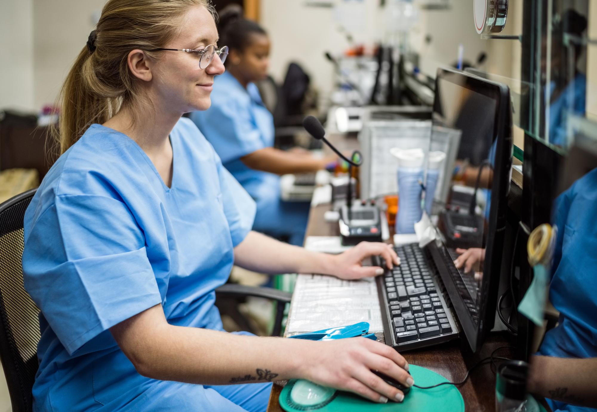 Nurse using a hospital computer