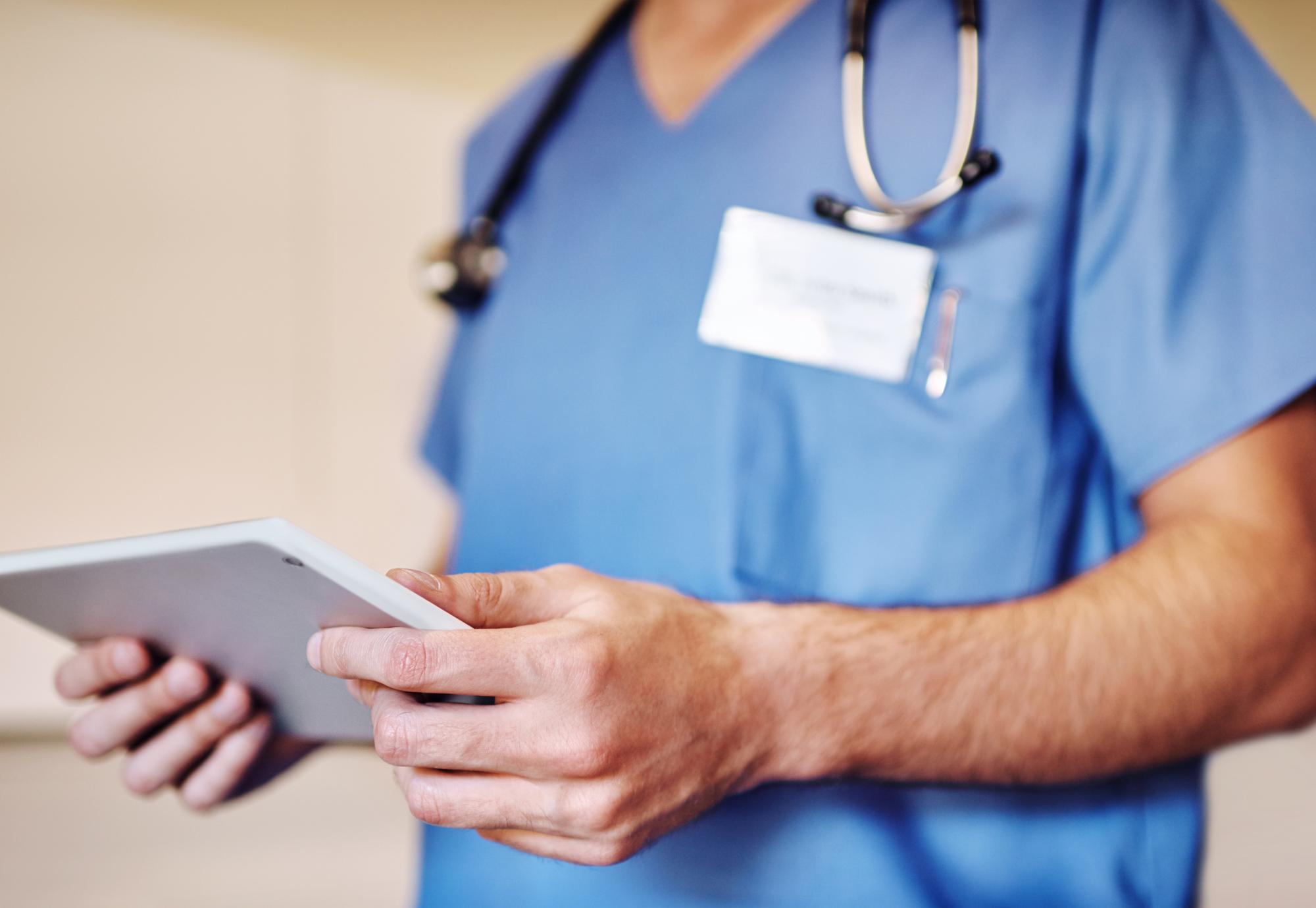 Healthcare worker with a tablet