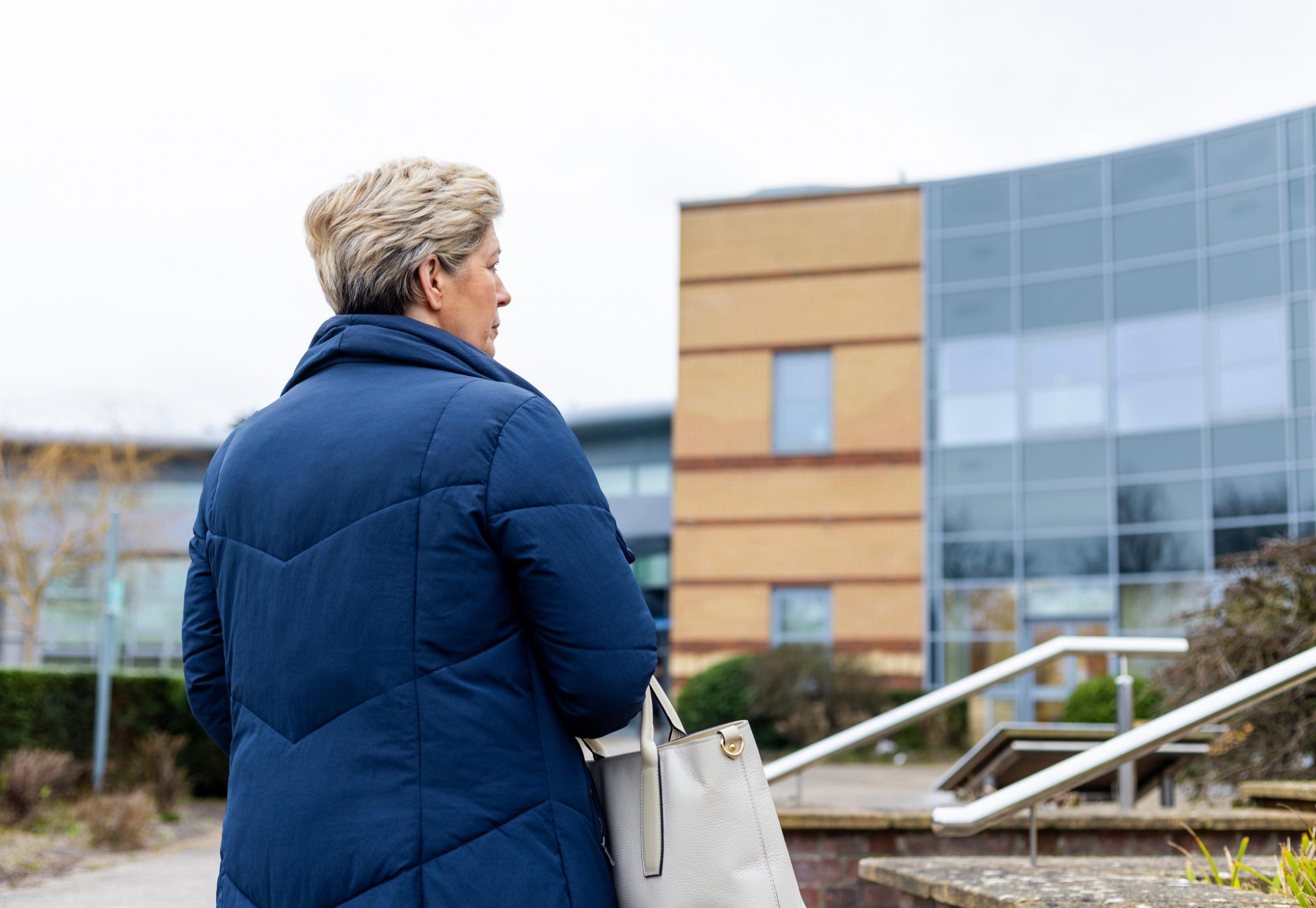 Woman outside a hospital