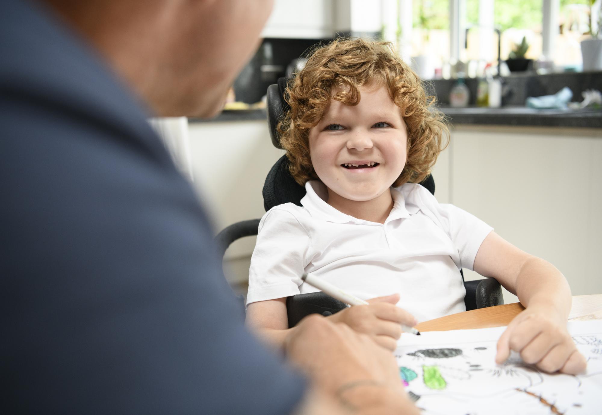 Young boy with muscular dystrophy