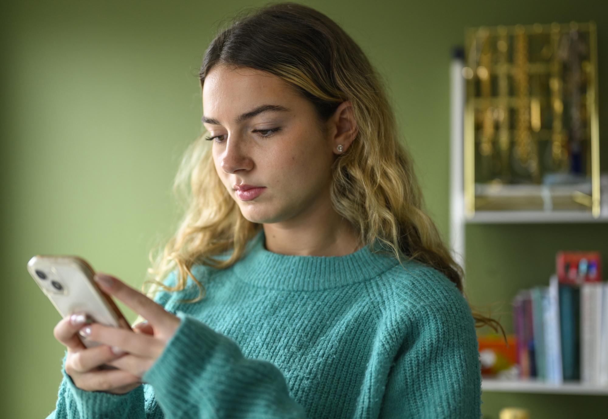 Young woman using a phone