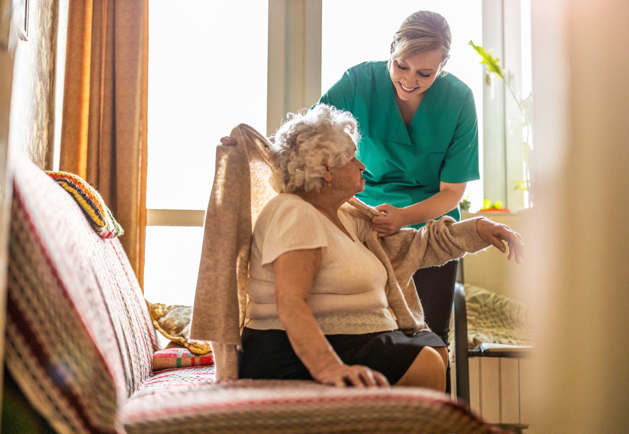 Old woman with care worker