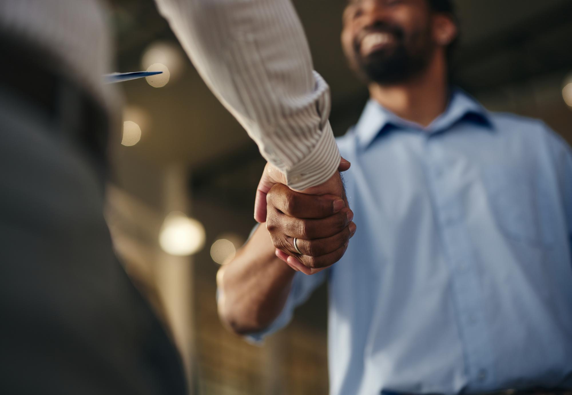 Two people shaking hands
