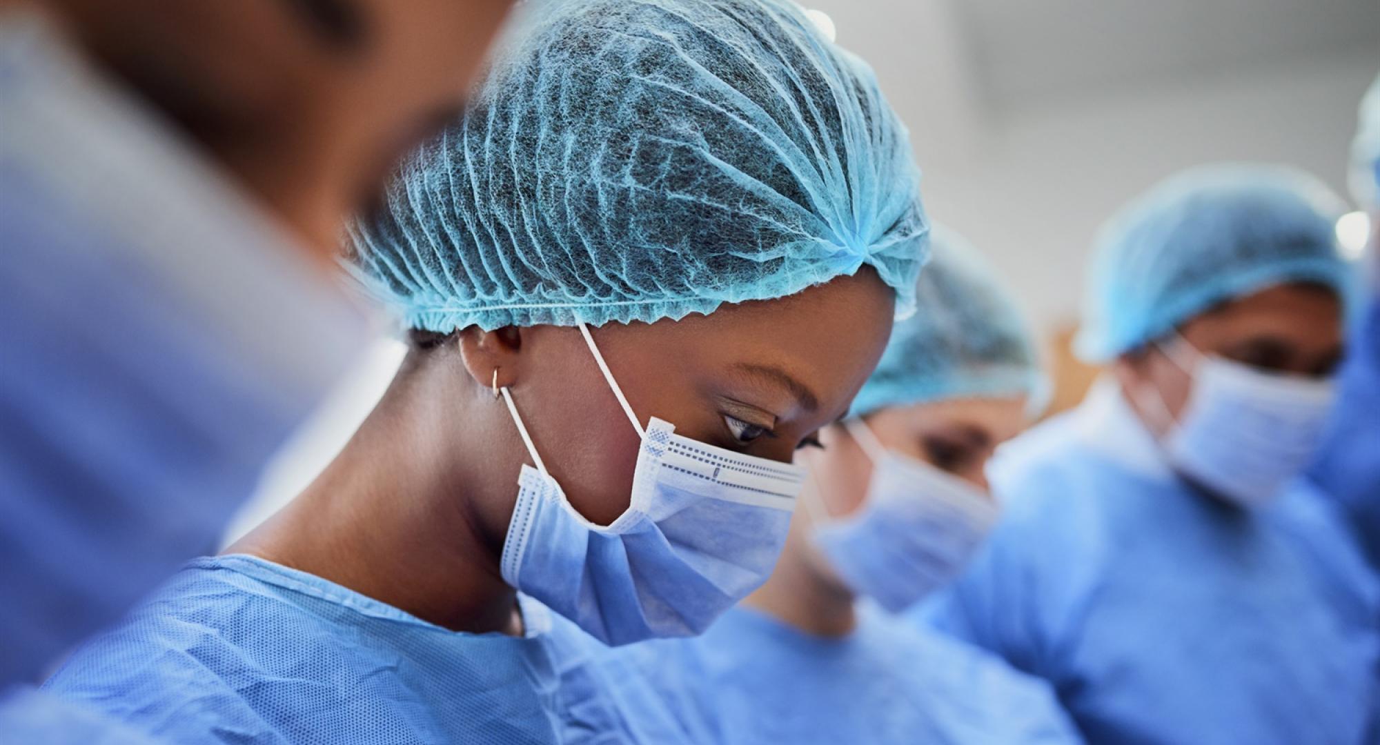 Female health professional in PPE