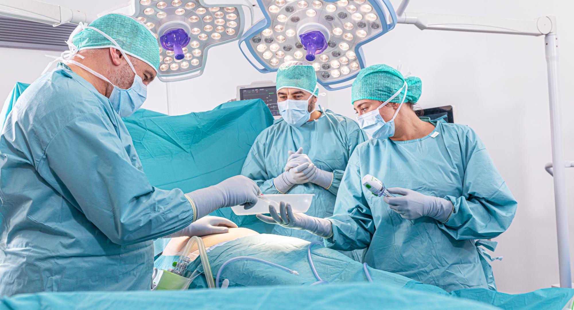 Surgical team performing an operation on a patient