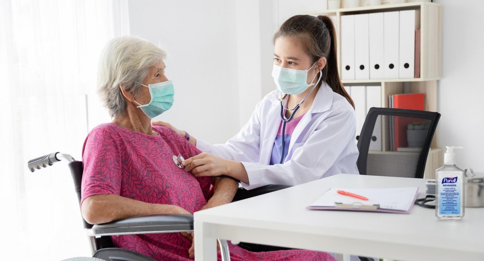 Woman receiving treatment from a healthcare professional